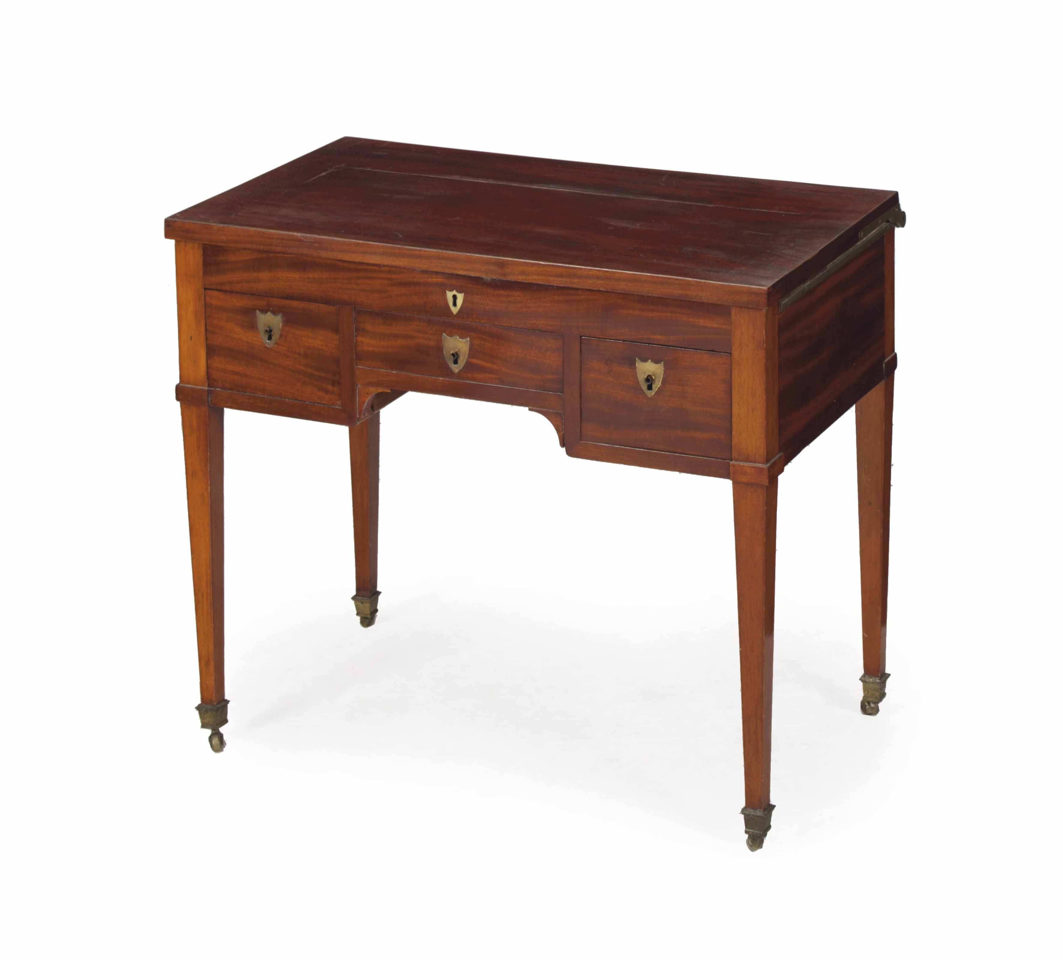 A DIRECTOIRE BRASSMOUNTED MAHOGANY LIFTTOP DRESSING TABLE,