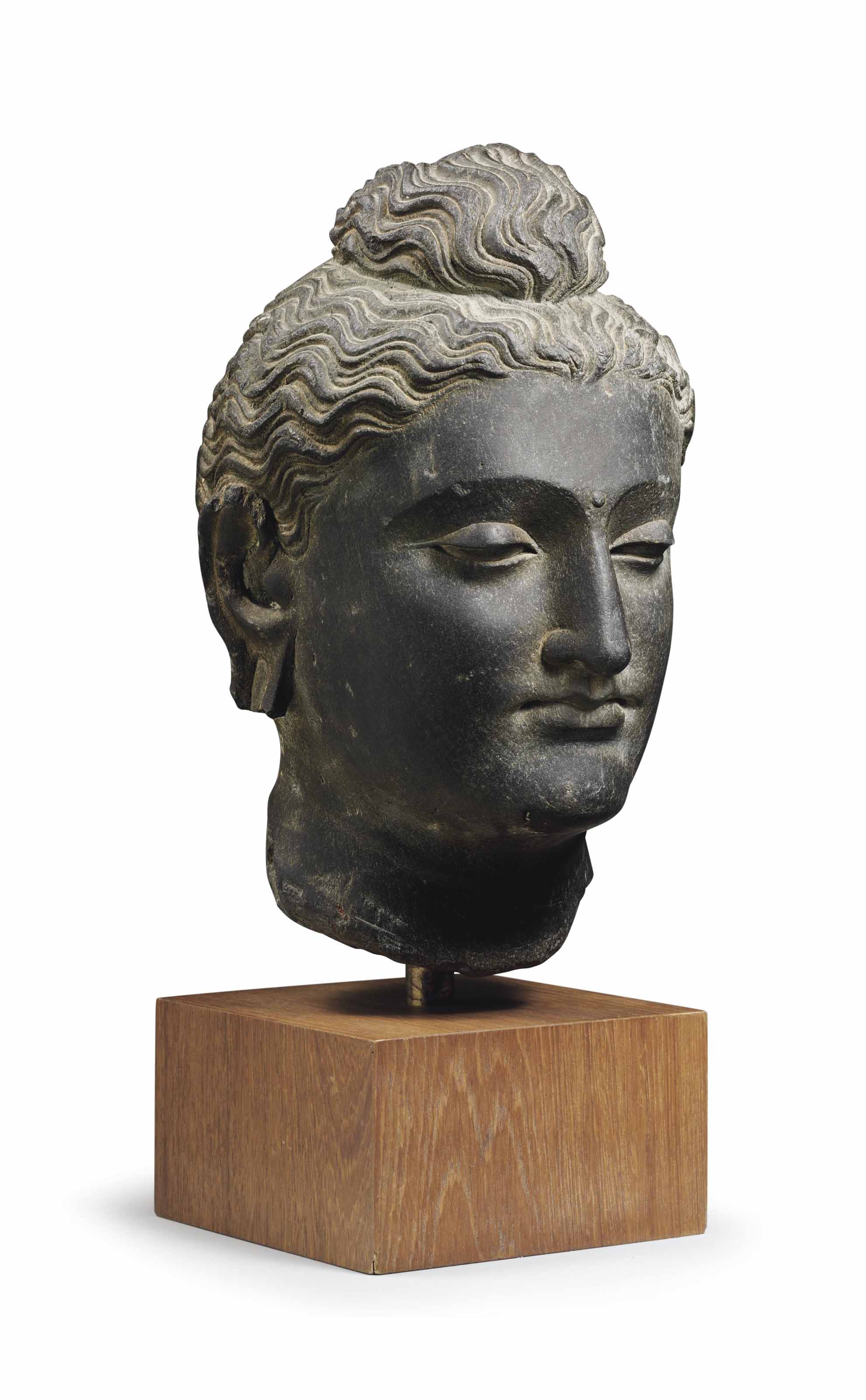 A Gray Schist Head Of Buddha Gandhara 2nd 3rd Century Sculptures Statues Figures Head Christie S