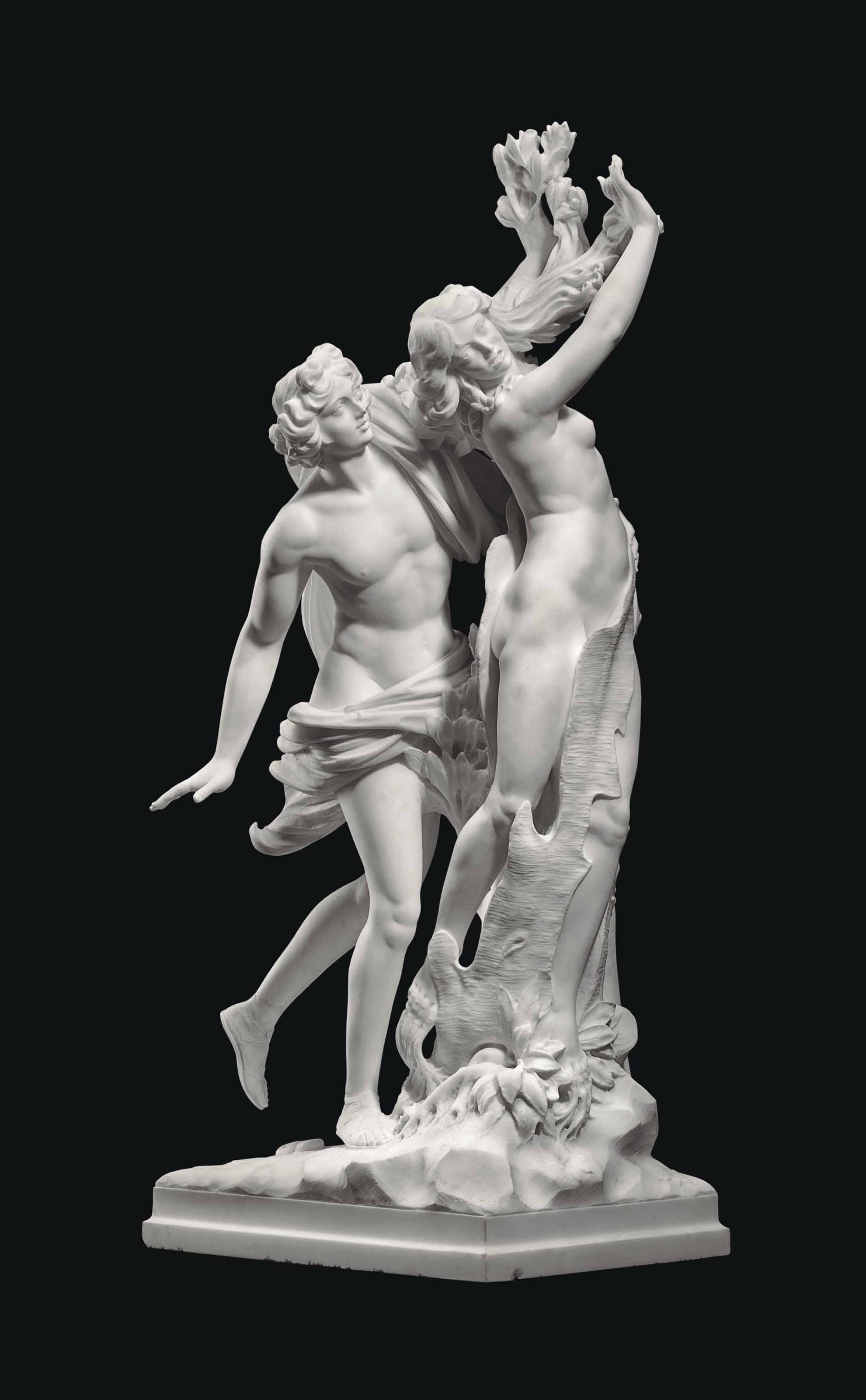 AN ITALIAN WHITE MARBLE GROUP OF APOLLO AND DAPHNE , AFTER