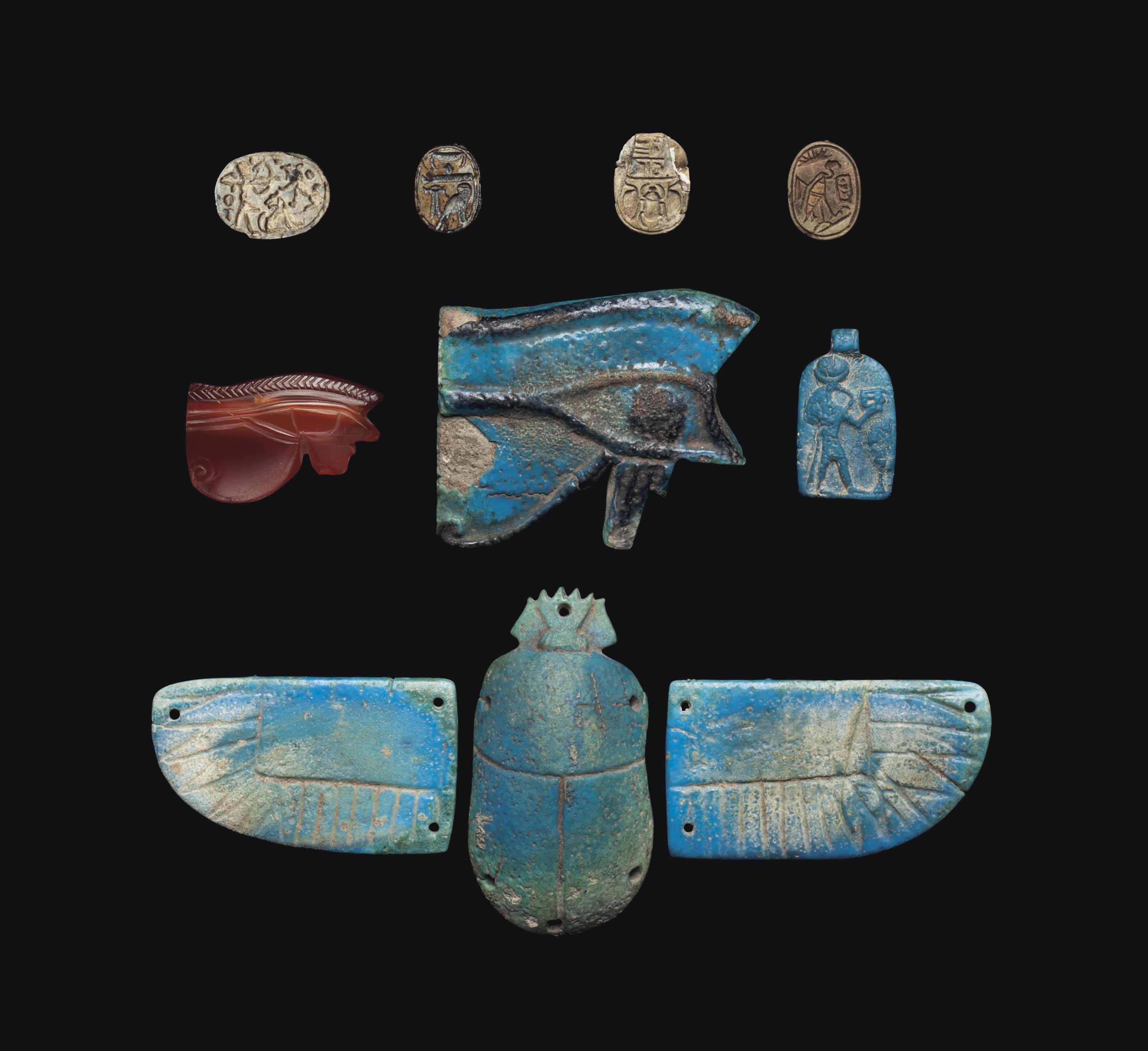 EIGHT EGYPTIAN STONE AND FAIENCE AMULETS , NEW KINGDOM TO PTOLEMAIC