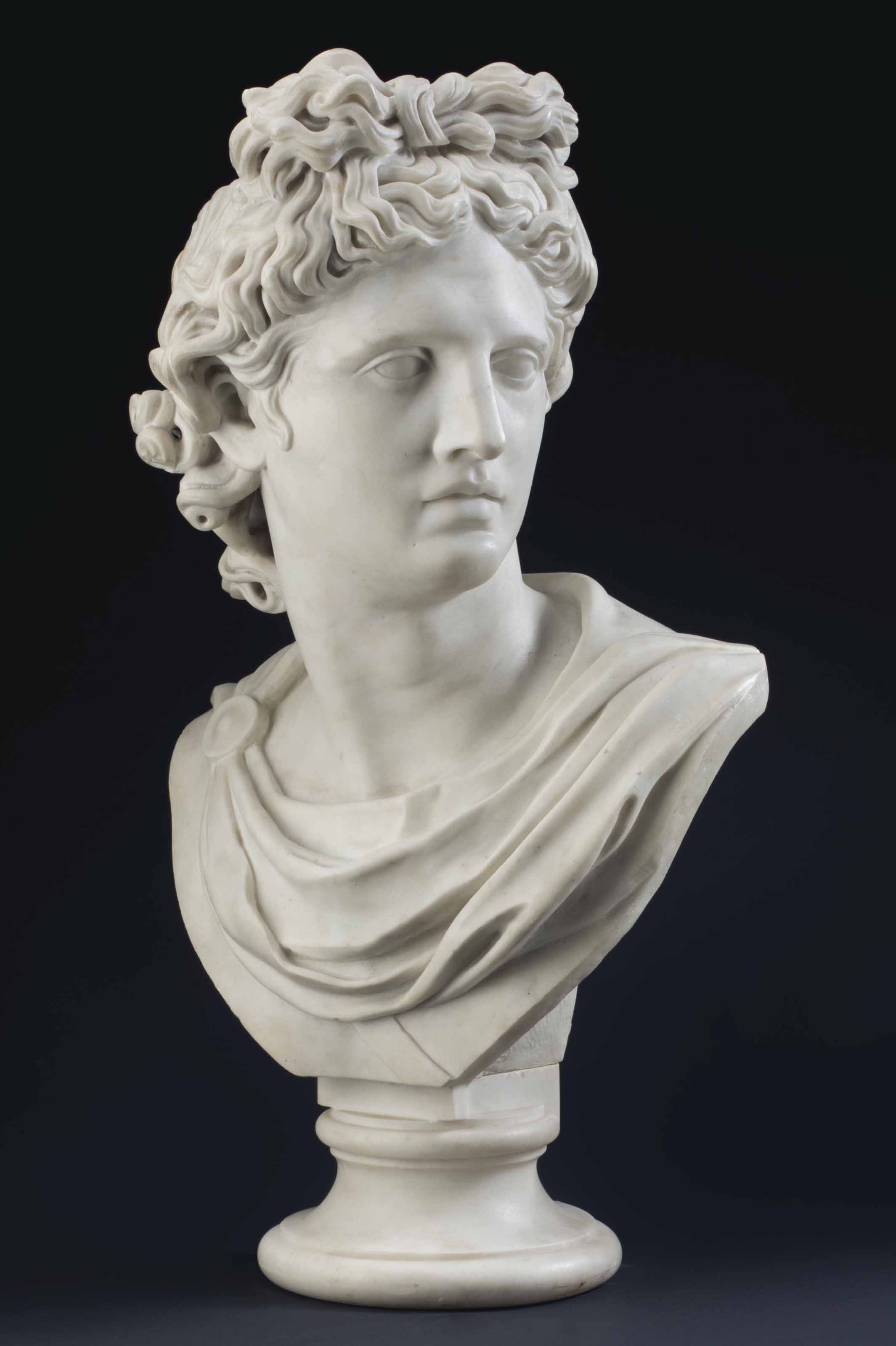 AN ITALIAN WHITE MARBLE BUST OF THE APOLLO BELVEDERE , LATE 19TH