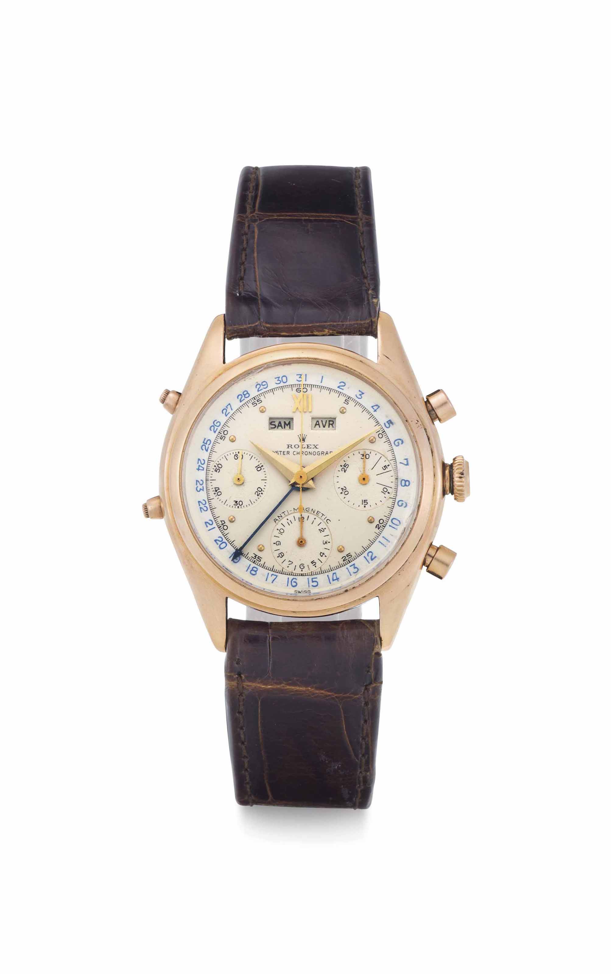 Rolex. A Fine and Rare 18k Pink Gold Triple Calendar Chronograph