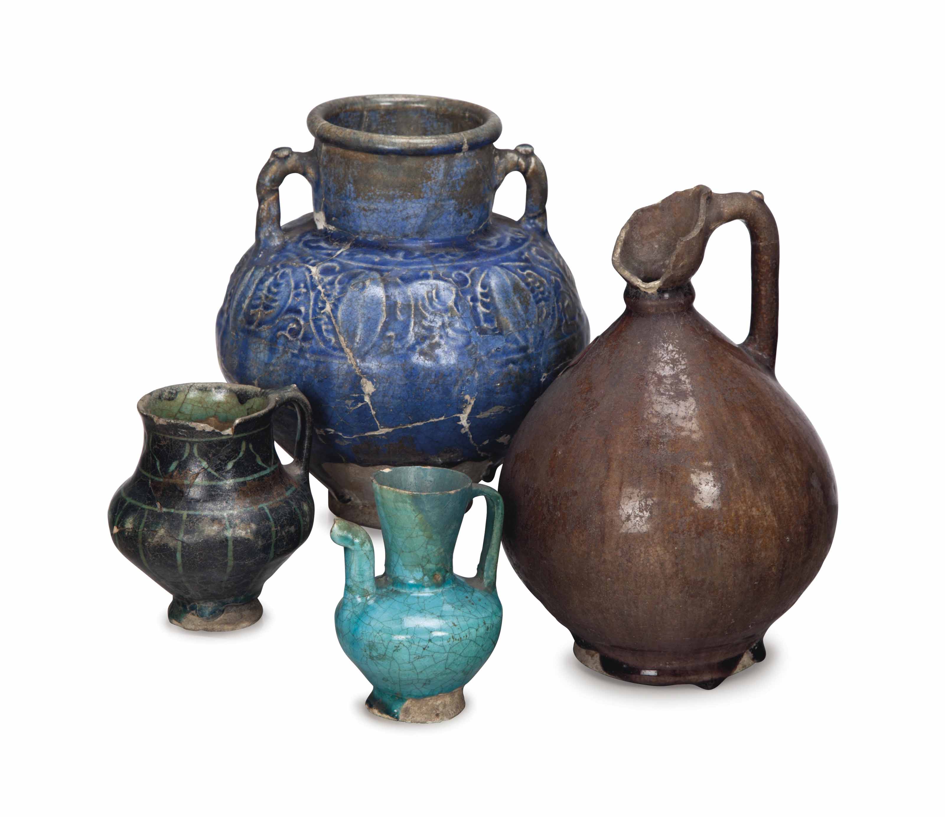 FOUR KASHAN GLAZED POTTERY VESSELS, , CENTRAL IRAN, 12TH13TH CENTURIES
