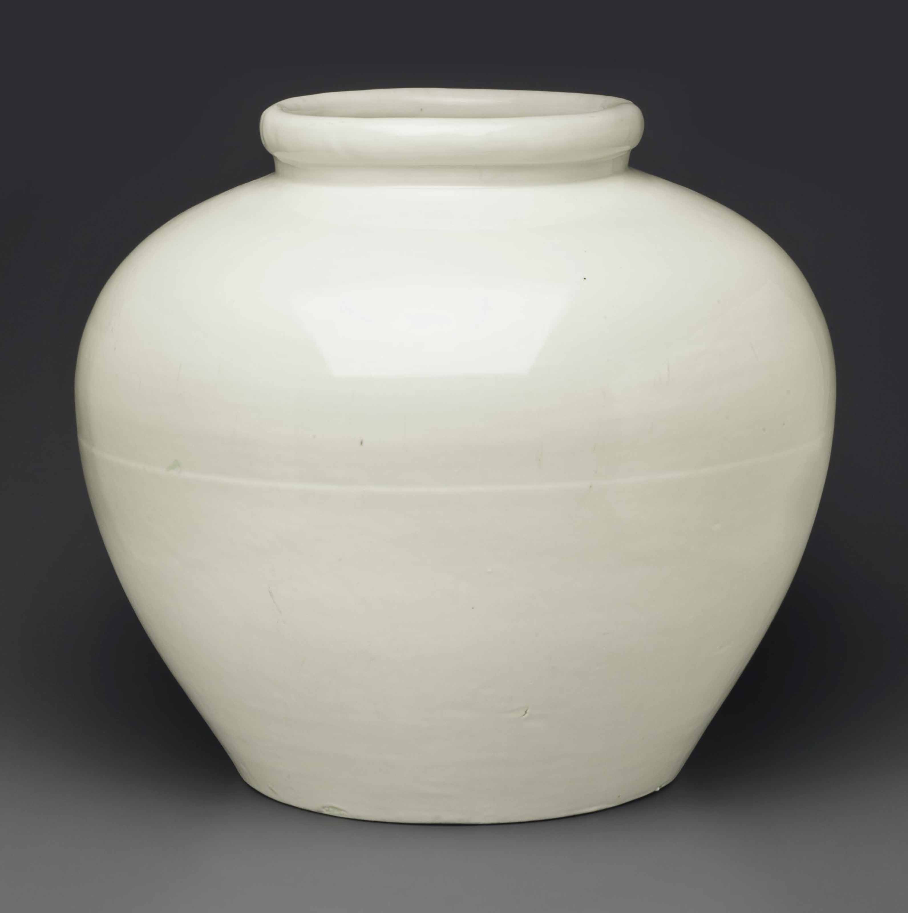 A RARE LARGE WHITEGLAZED GLOBULAR JAR , MING DYNASTY, EARLY 15TH