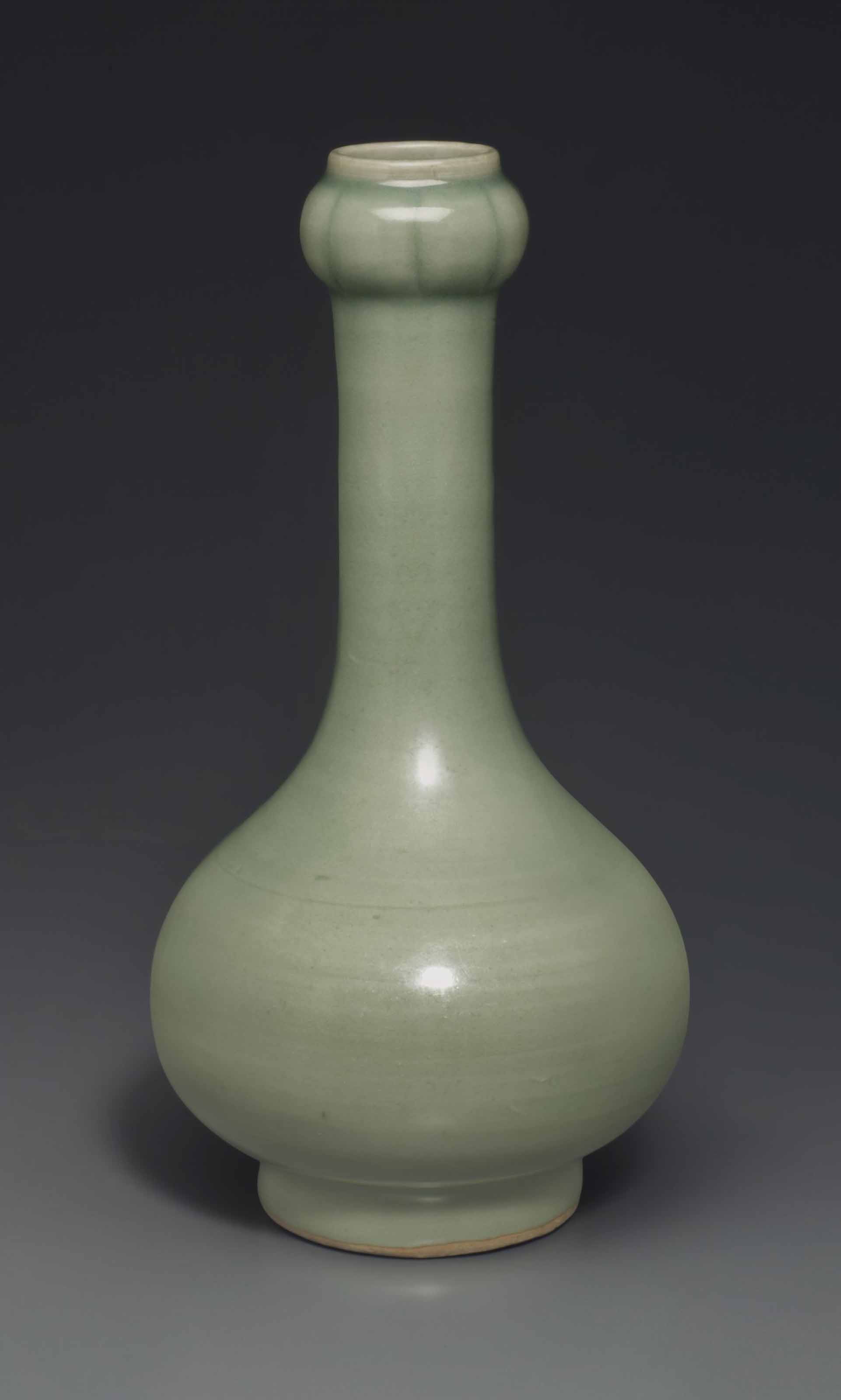 AN UNUSUAL LONGQUAN CELADON 'GARLICHEAD' BOTTLE VASE , MING DYNASTY