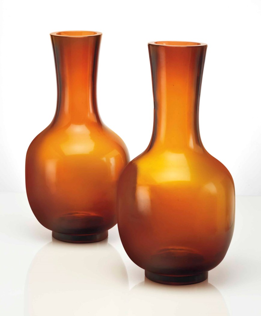 A PAIR OF AMBER GLASS VASES