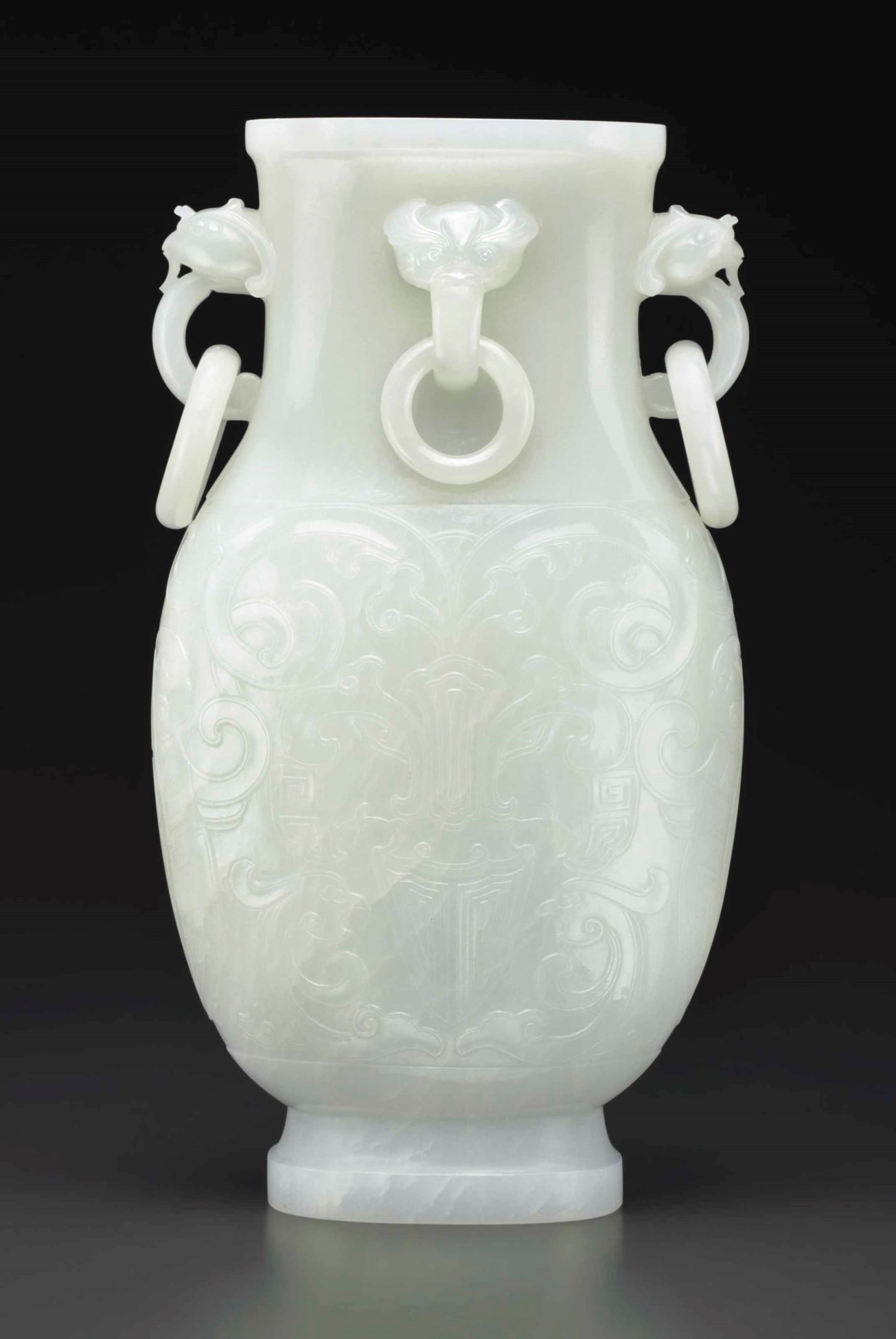 A SUPERB WHITE JADE ARCHAISTIC VASE AND COVER , QIANLONG PERIOD (1736