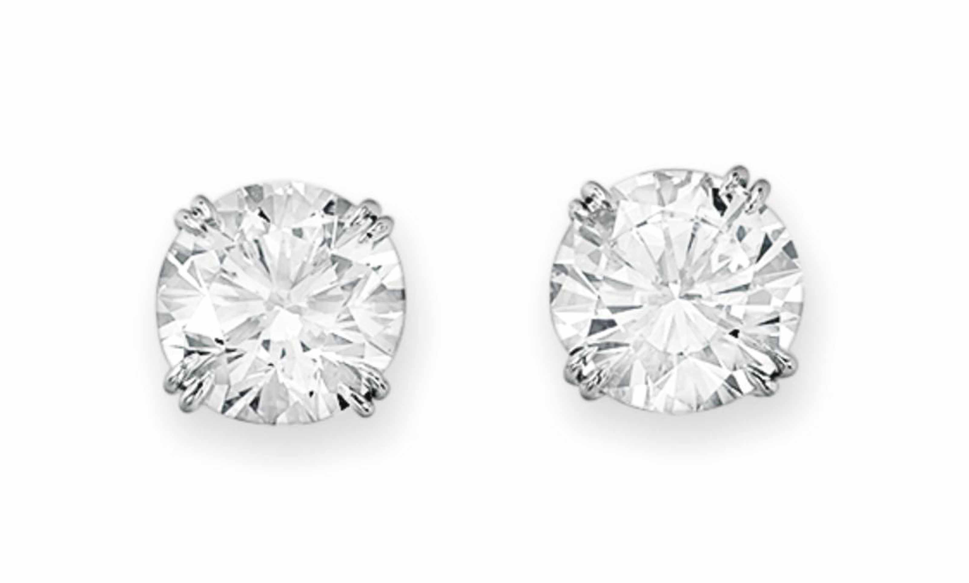 A PAIR OF DIAMOND EAR STUDS, BY HARRY WINSTON Christie's