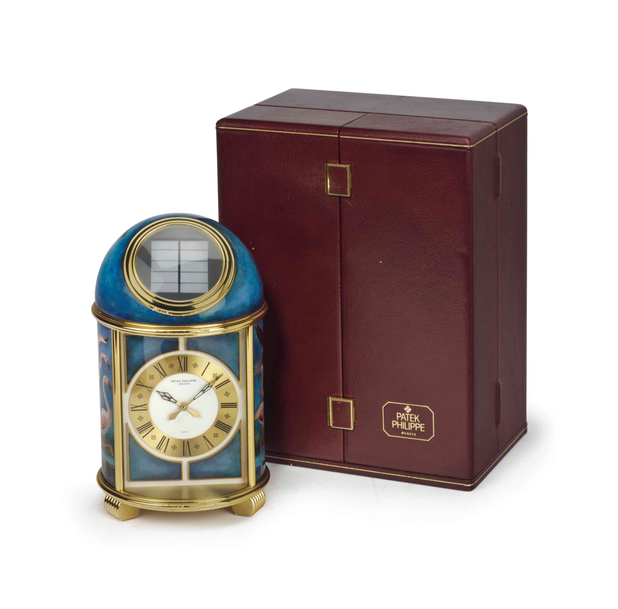 Patek Philippe. A Fine and Unique Gilt Brass and Cloisonné Enamel Solar