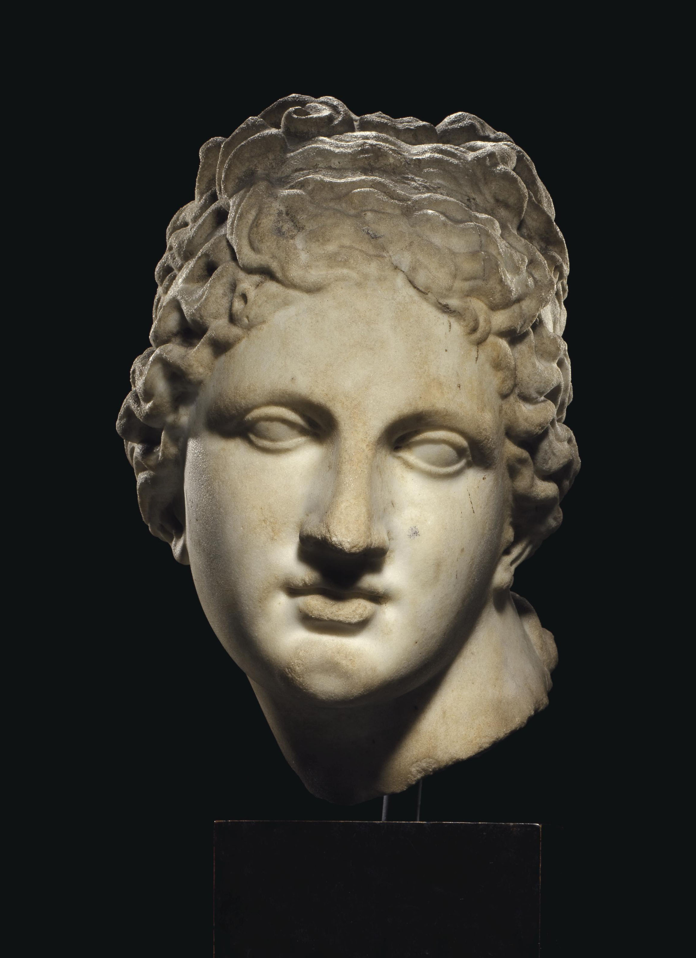 A ROMAN MARBLE HEAD OF VENUS , CIRCA 1ST CENTURY B.C.1ST CENTURY A.D