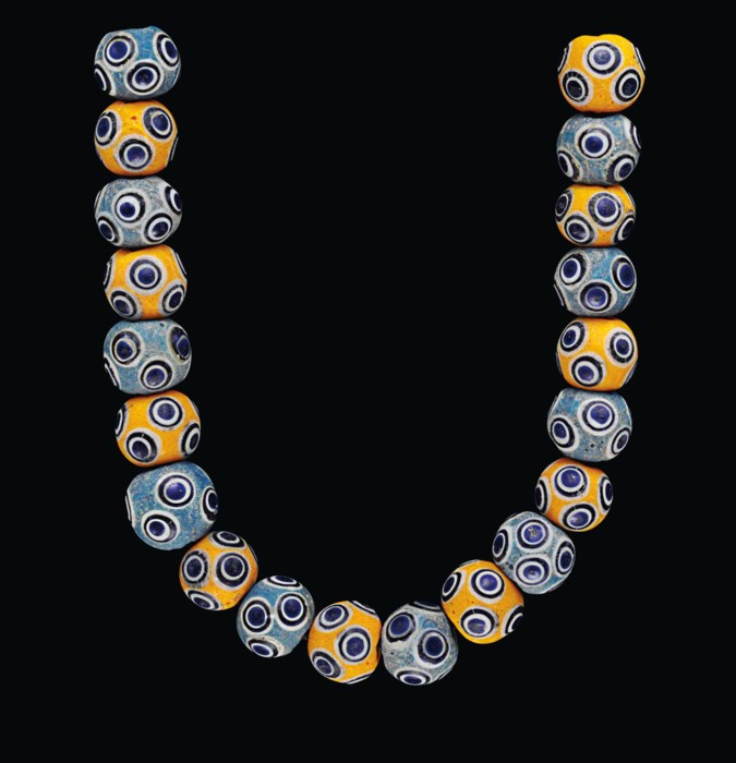 TWENTY MEDITERRANEAN GLASS EYE BEADS