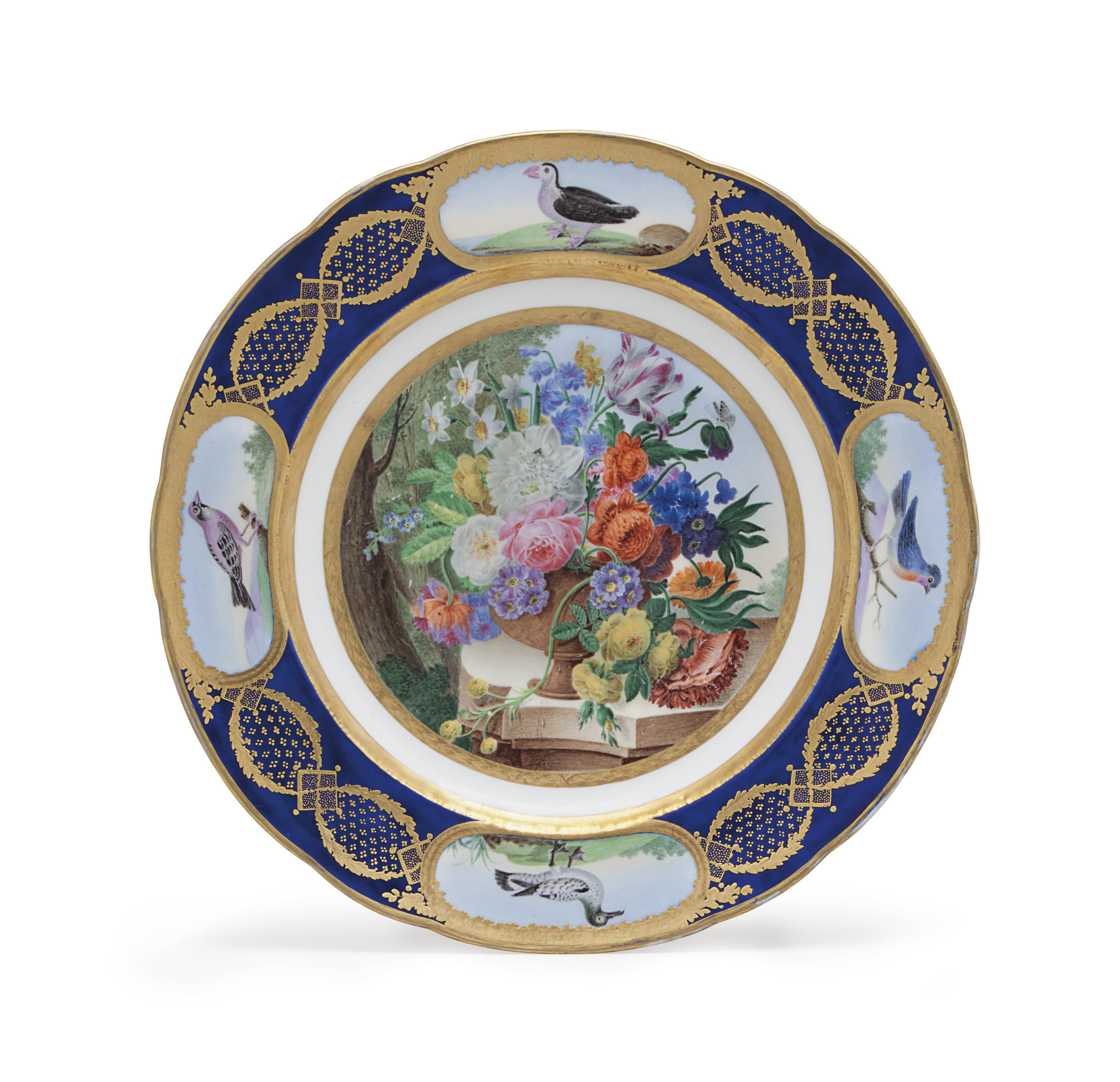 A SEVRES PORCELAIN (LATERDECORATED) BLUEGROUND ORNITHOLOGICAL PLATE
