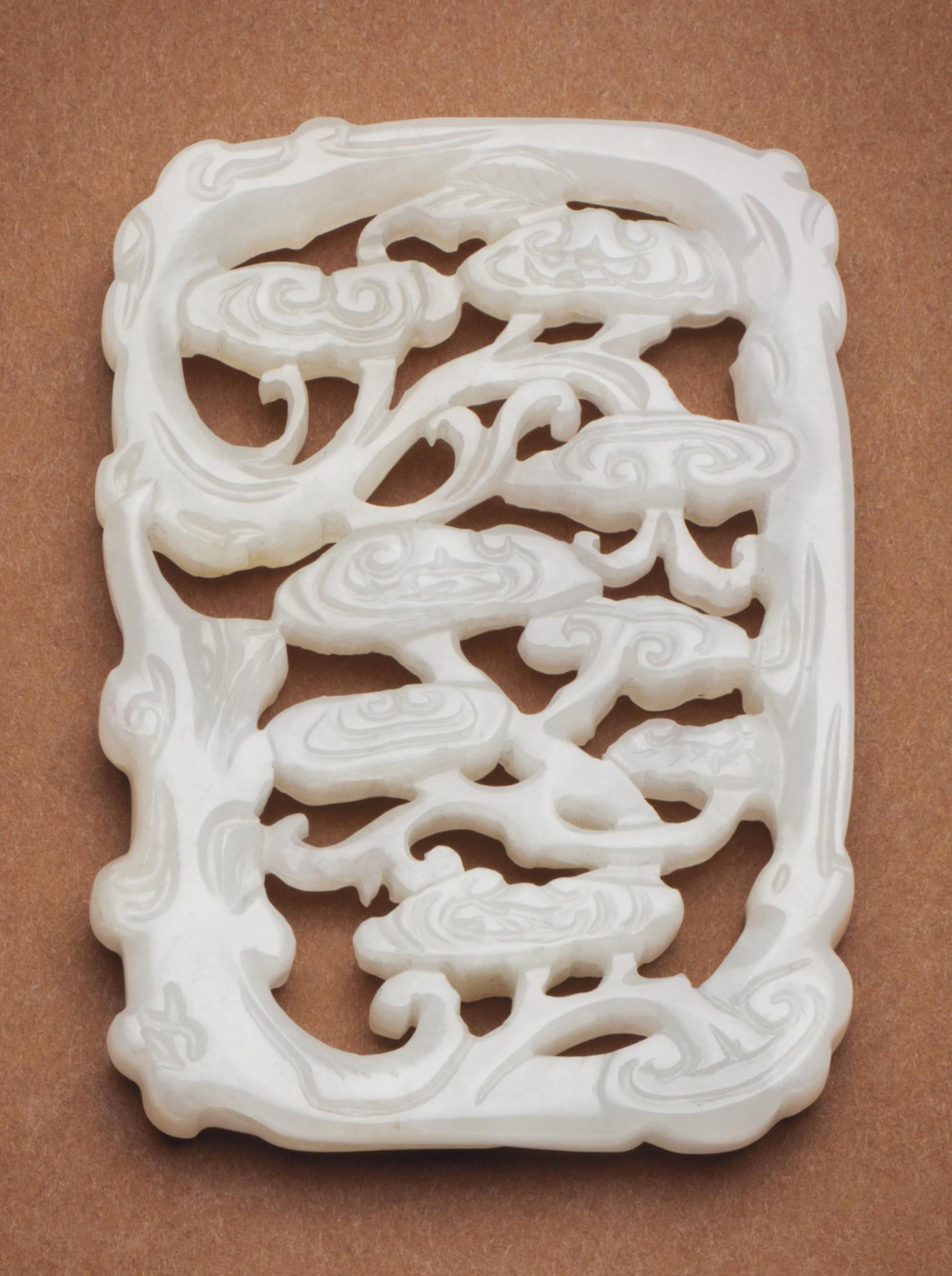 AN UNUSUAL WHITE JADE RECTANGULAR OPENWORK ORNAMENT , 19TH CENTURY