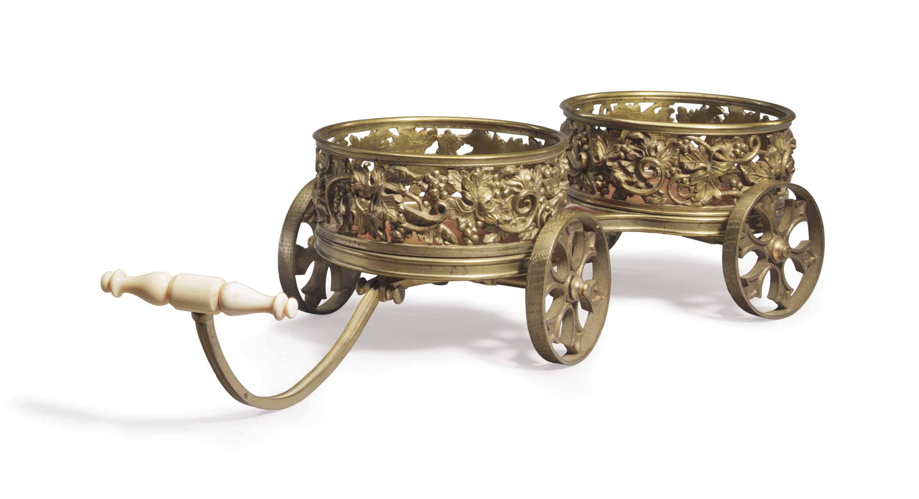 A VICTORIAN BRASS AND MAHOGANY WINE TROLLEY , MID19TH CENTURY Christie's