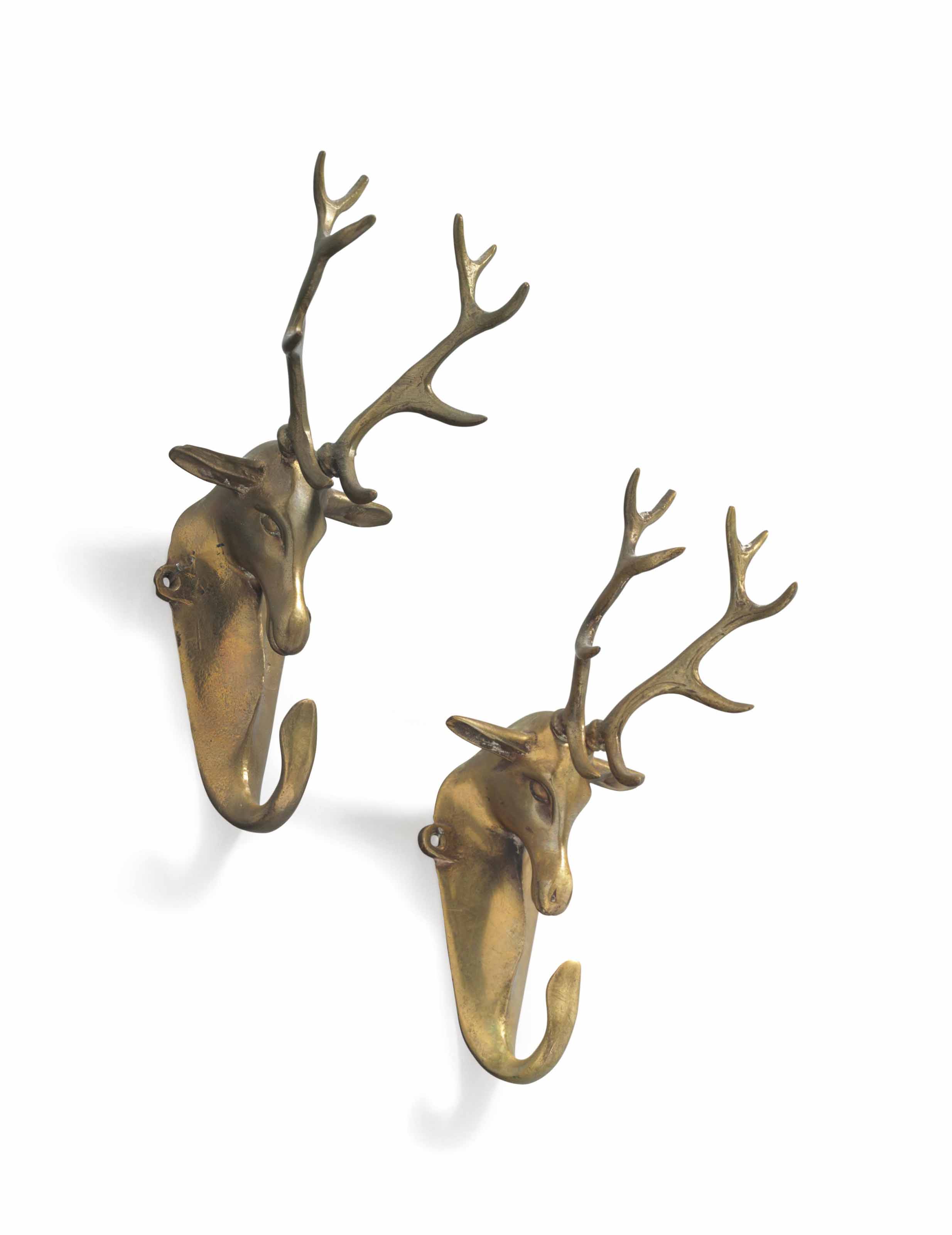 A PAIR OF BRASS COAT HOOKS , MODERN Christie's