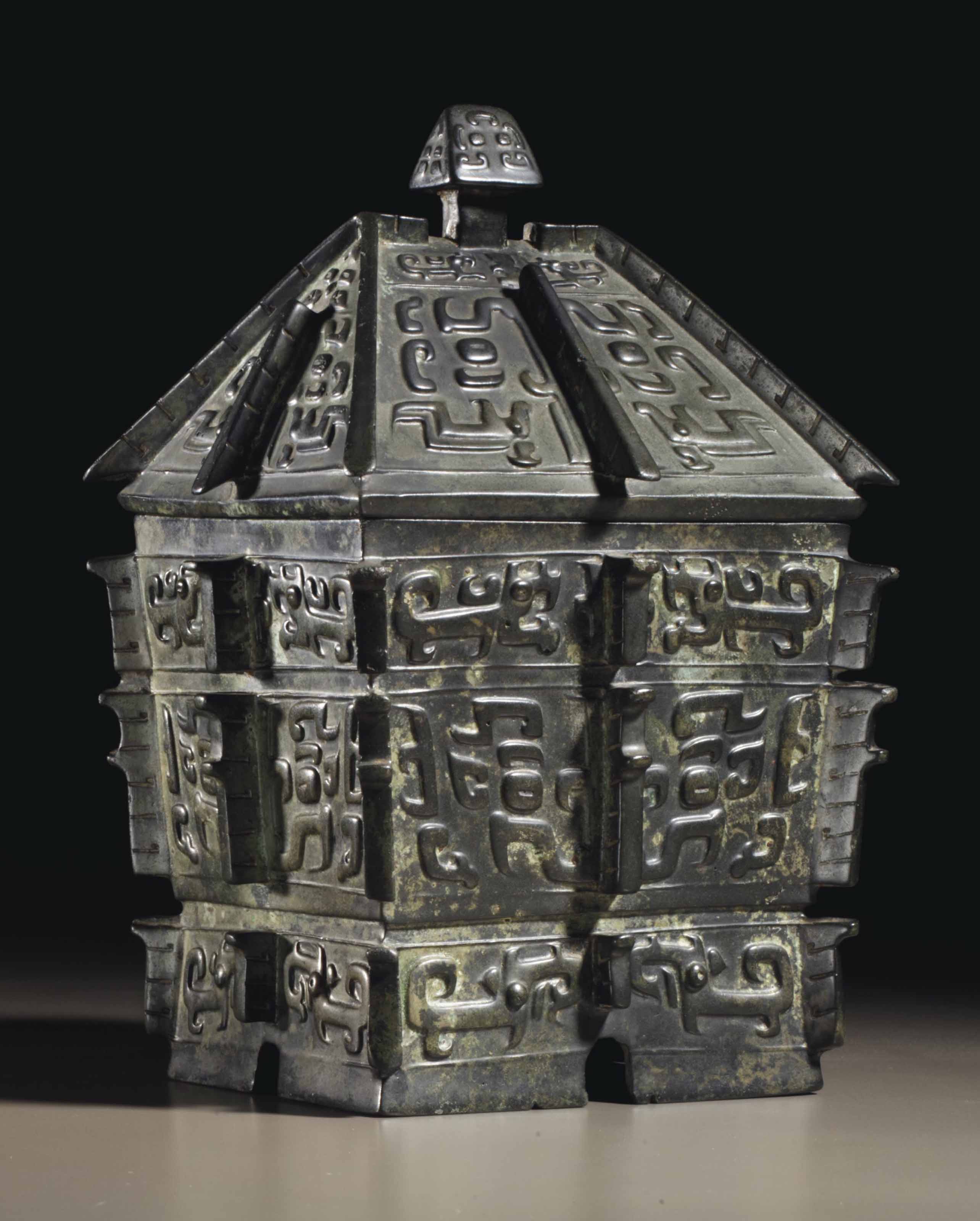 AN IMPORTANT AND VERY RARE BRONZE RITUAL WINE VESSEL AND COVER, FANGYI