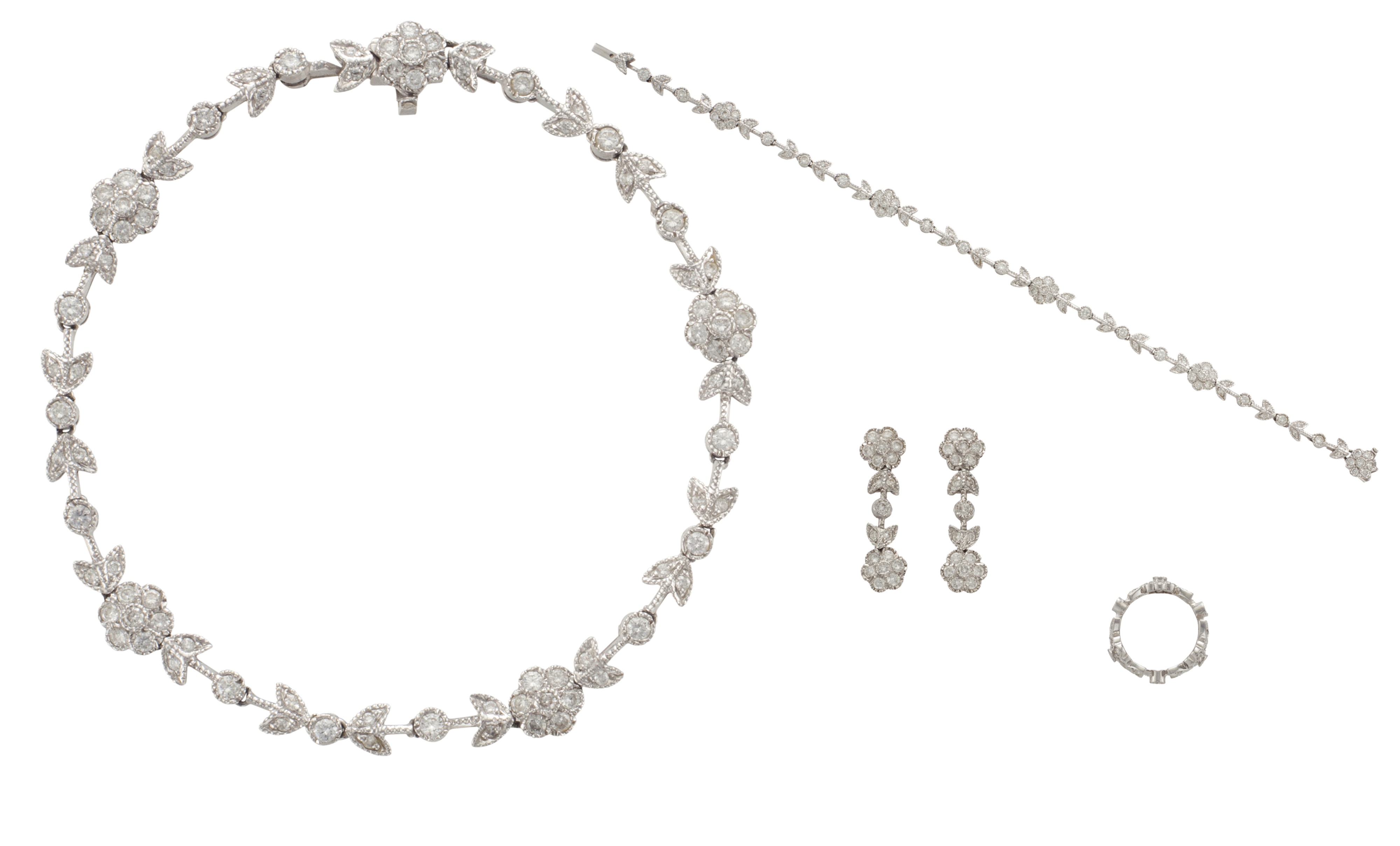 A SUITE OF DIAMOND GARLAND JEWELRY, Christie’s