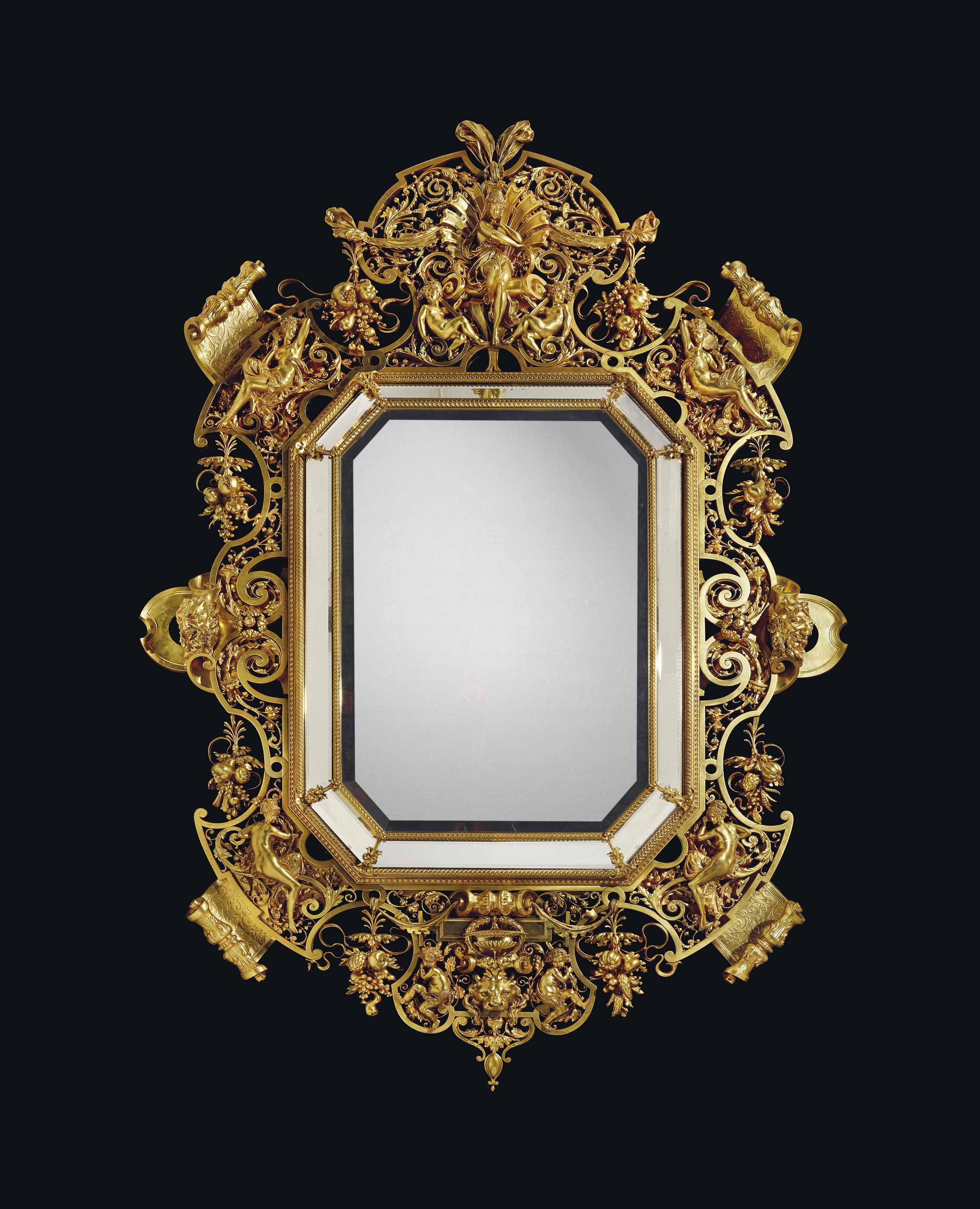 AN IMPORTANT NAPOLEON III ORMOLU MIRROR , BY FERDINAND BARBEDIENNE, TO A DESIGN BY ALBERTERNEST