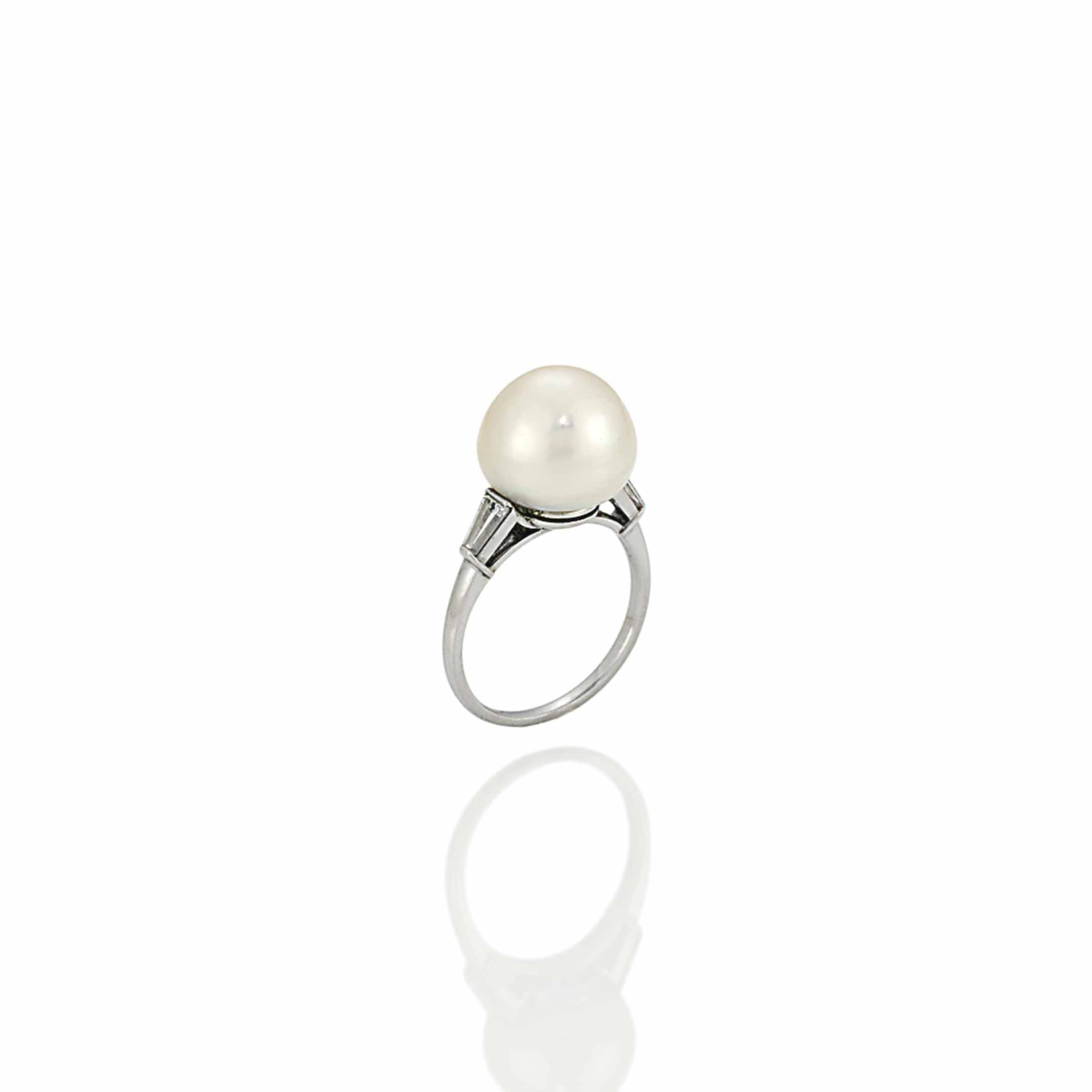 A Natural Pearl And Diamond Ring By Bulgari Bvlgari mother of pearl inlay 18k yellow gold circular ring size 52 380444 →. a natural pearl and diamond ring by