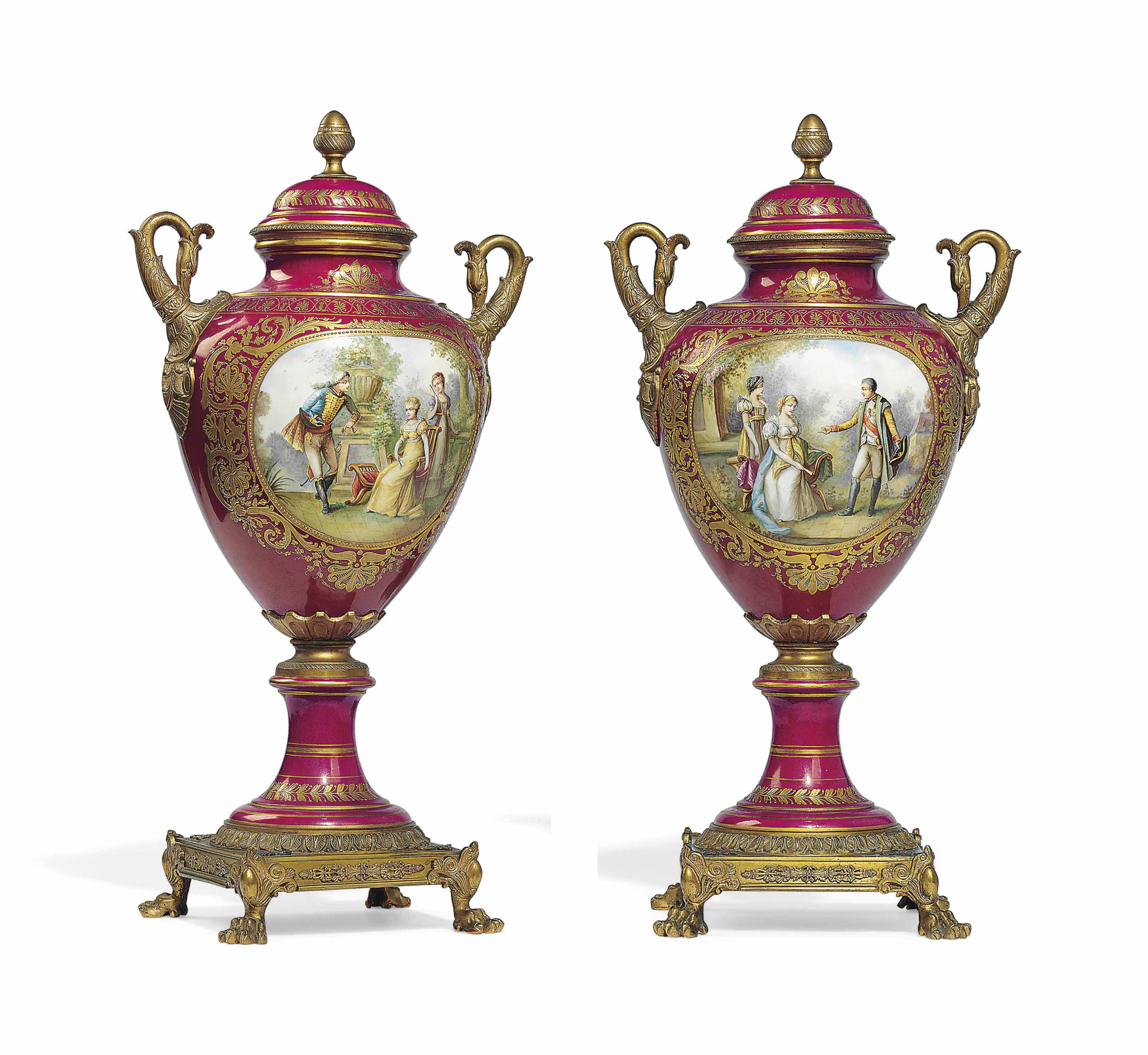 A PAIR OF ORMOLUMOUNTED SEVRESSTYLE PORCELAIN PINK GROUND VASES AND