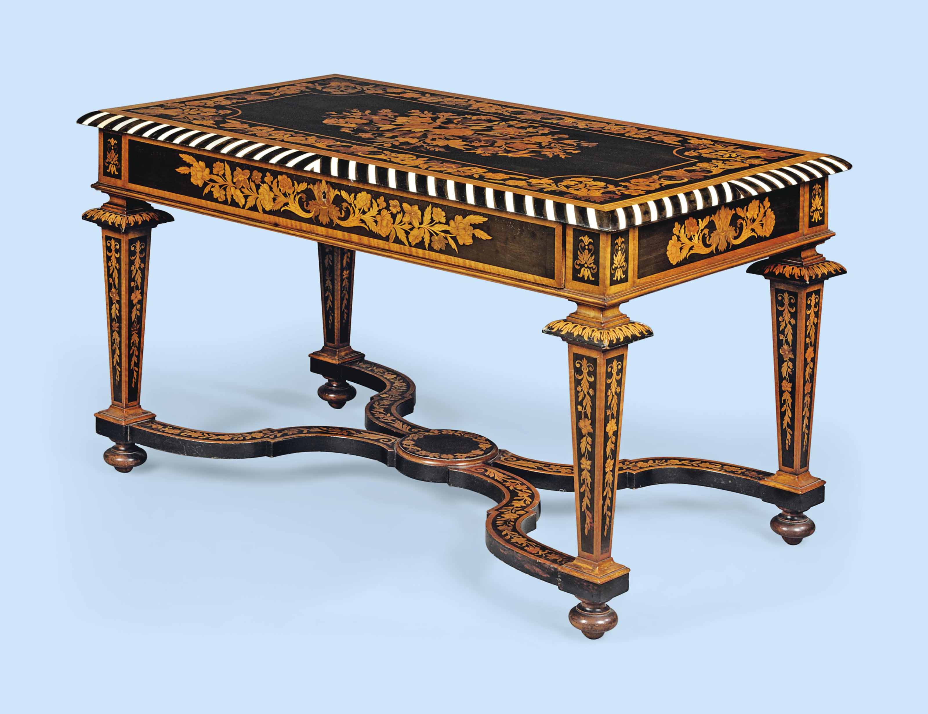 A MIDVICTORIAN IVORYINLAID EBONY, MAHOGANY, ROSEWOOD AND FRUITWOOD