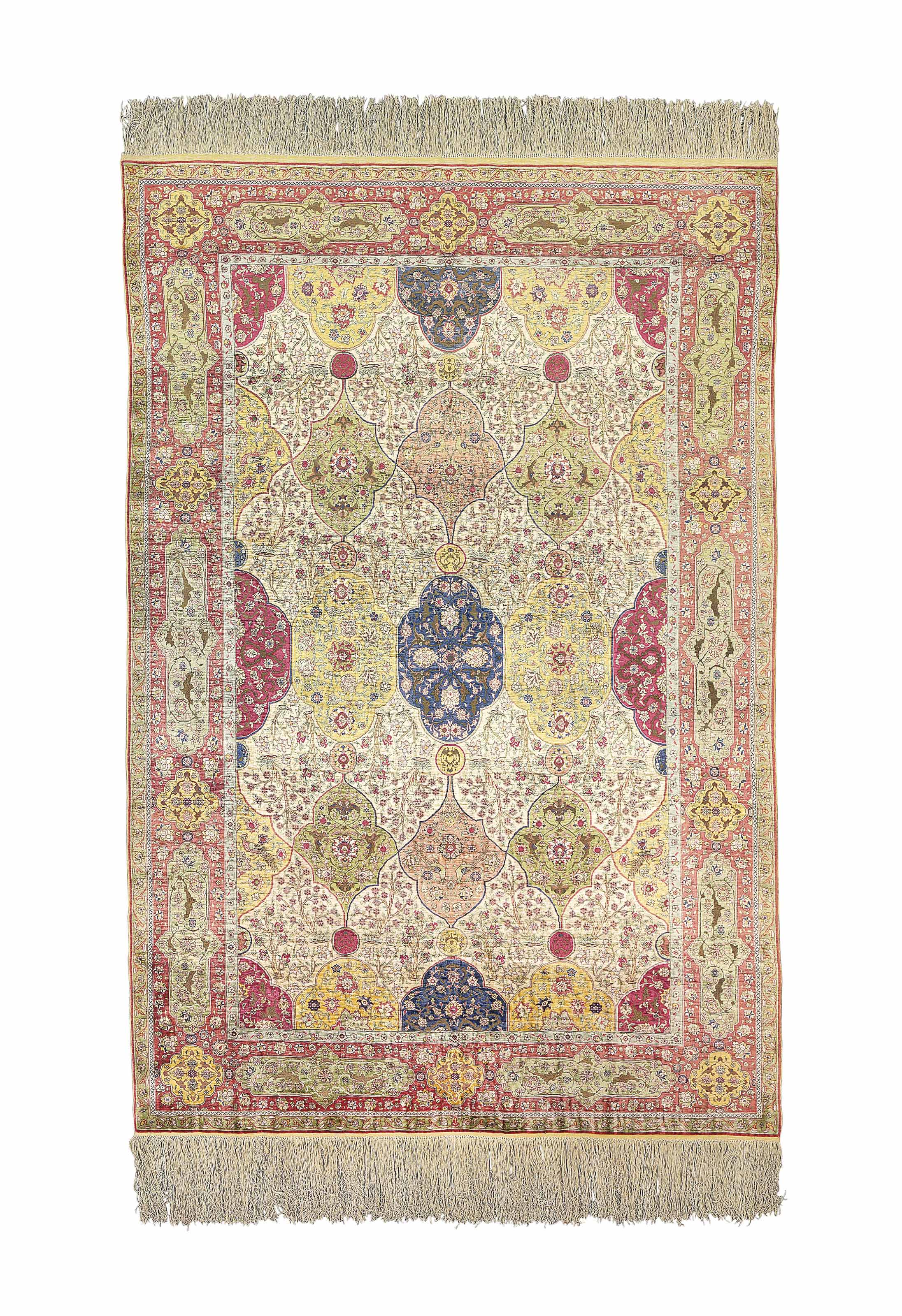 A SIGNED SILK AND METALTHREAD KOUM KAPI RUG , SIGNED, ISTANBUL, TURKEY