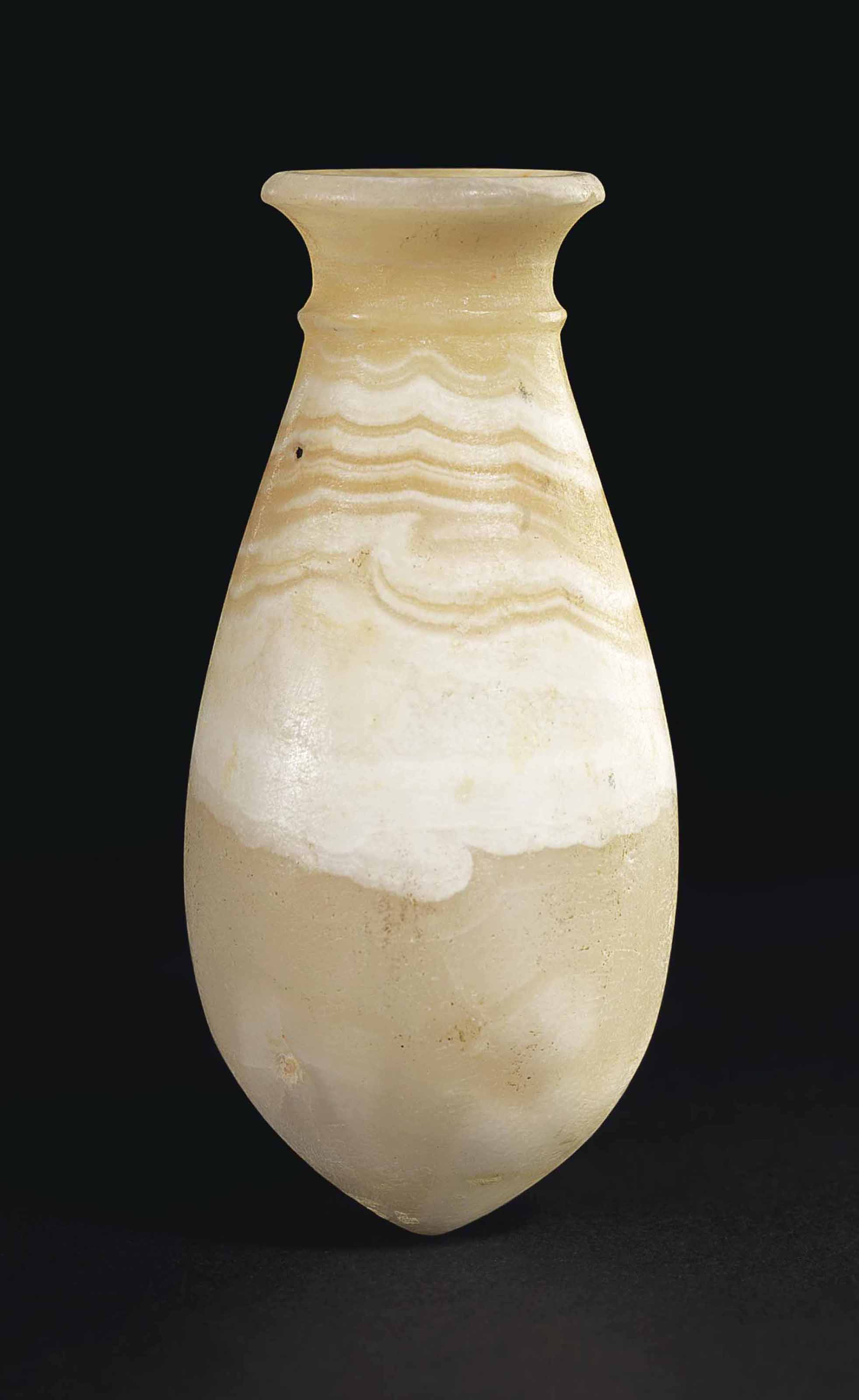 AN EGYPTIAN BANDED ALABASTER JAR , NEW KINGDOM, 18TH DYNASTY, CIRCA