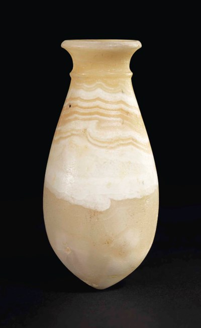 AN EGYPTIAN BANDED ALABASTER JAR , NEW KINGDOM, 18TH DYNASTY, CIRCA