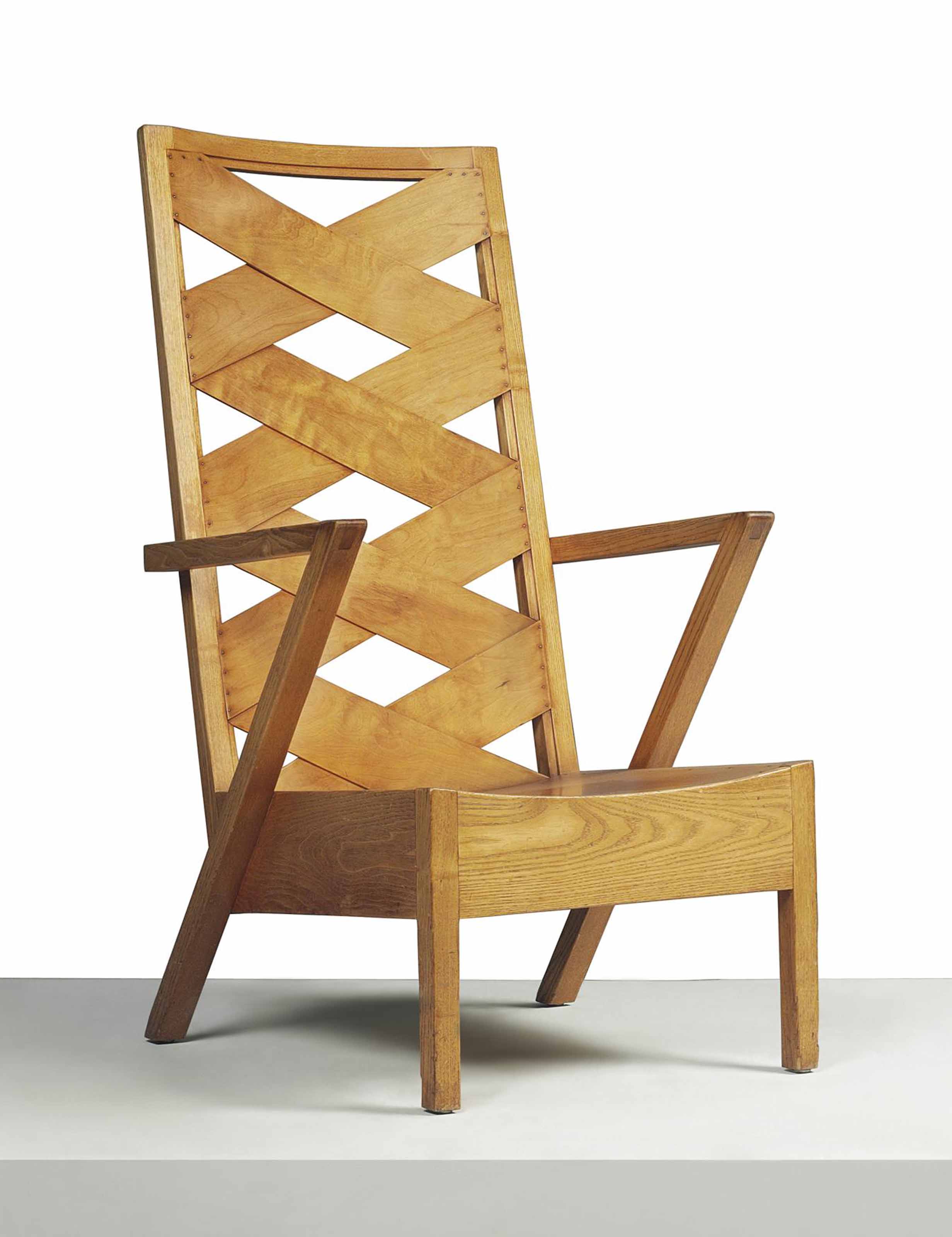 A RARE OPEN ARMCHAIR, 1942