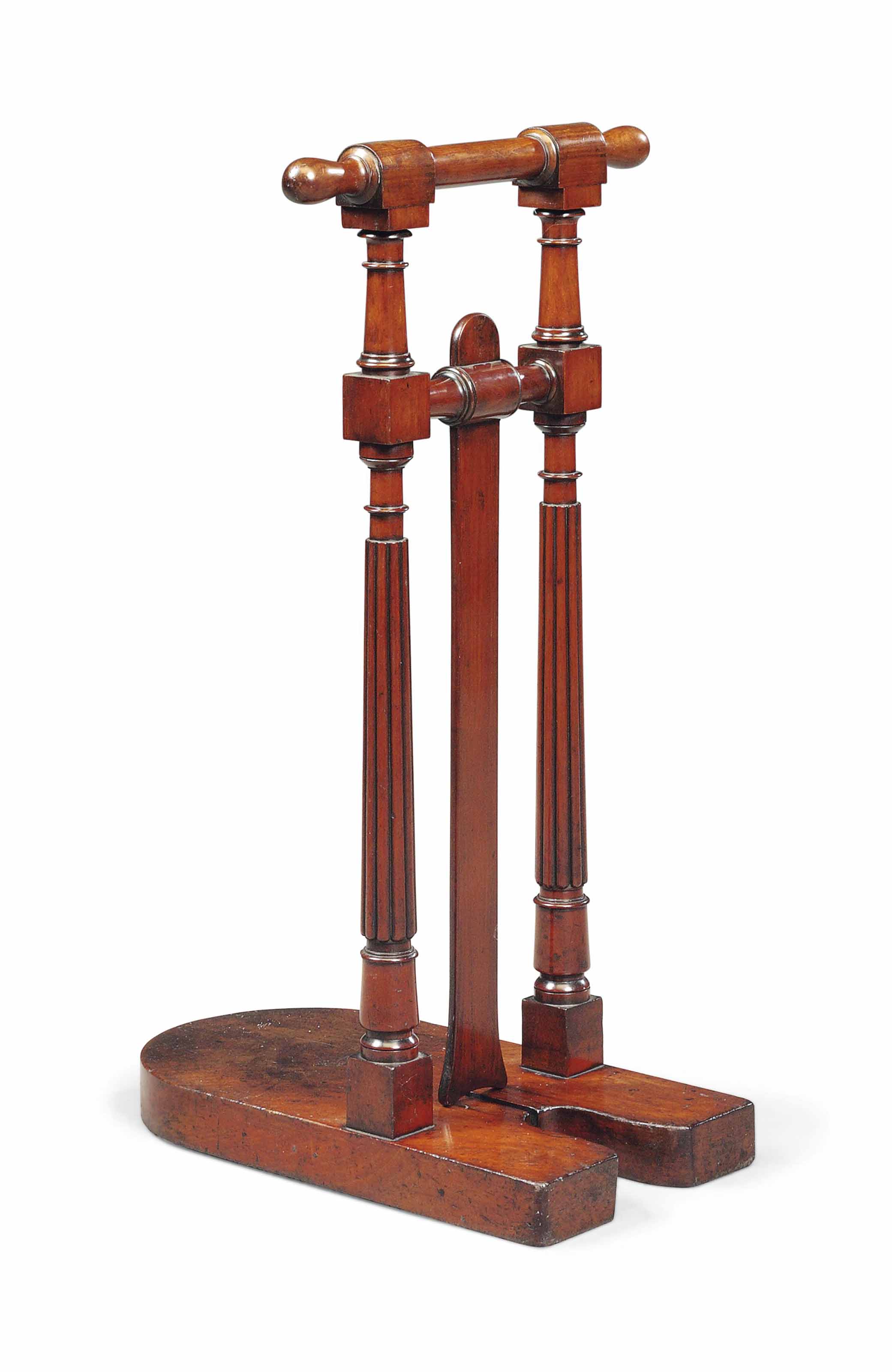 AN EARLY VICTORIAN MAHOGANY BOOT JACK