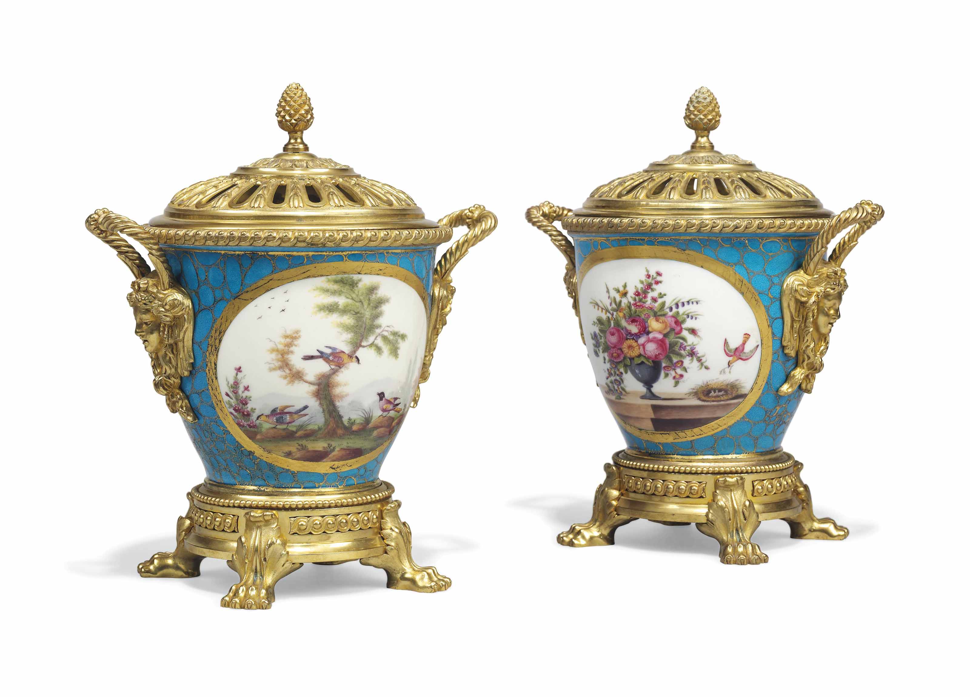 A PAIR OF FRENCH ORMOLUMOUNTED SEVRESSTYLE POTPOURRI VASES AND