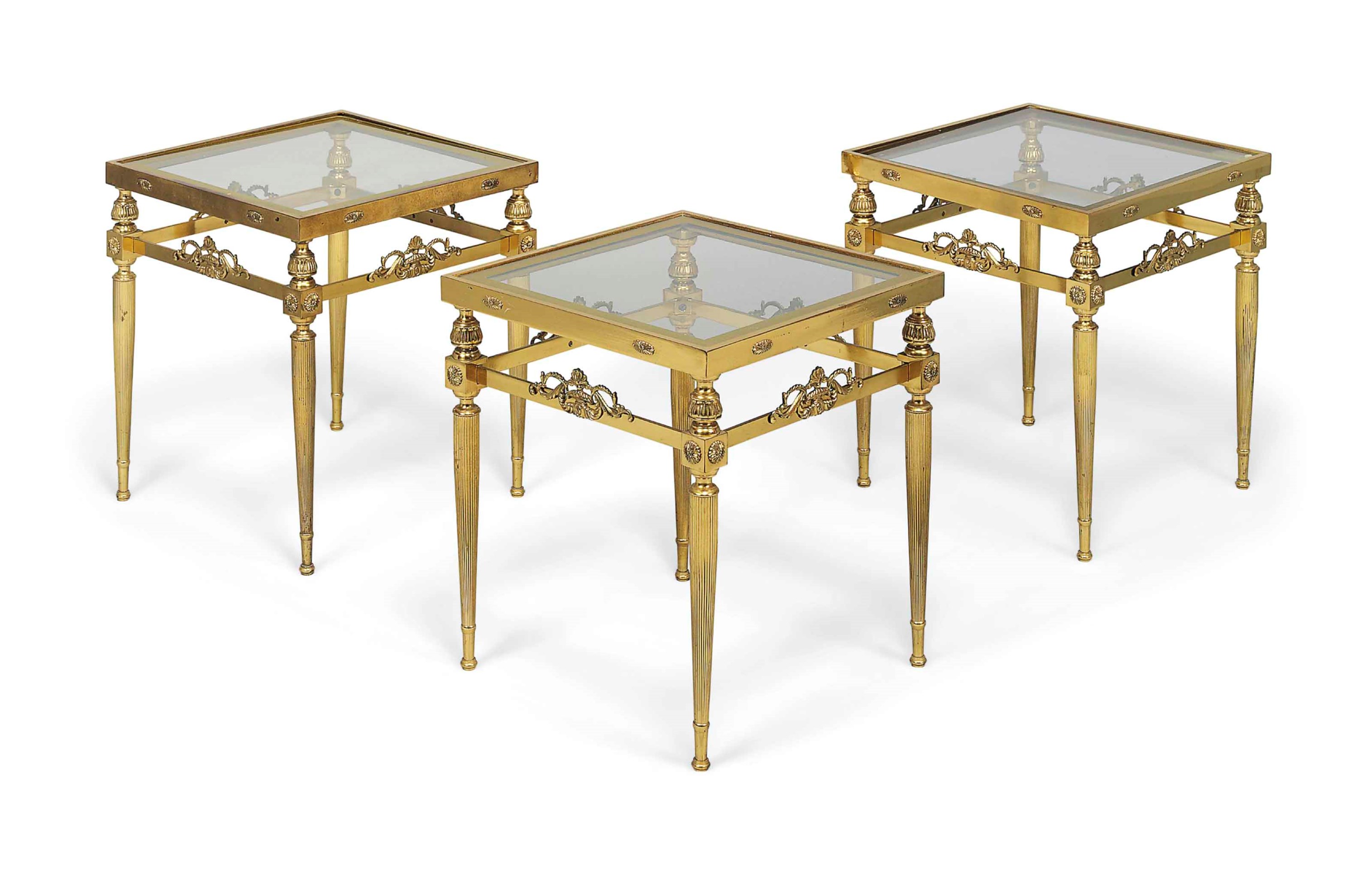A SET OF THREE BRASS SIDE TABLES, MODERN Christie's