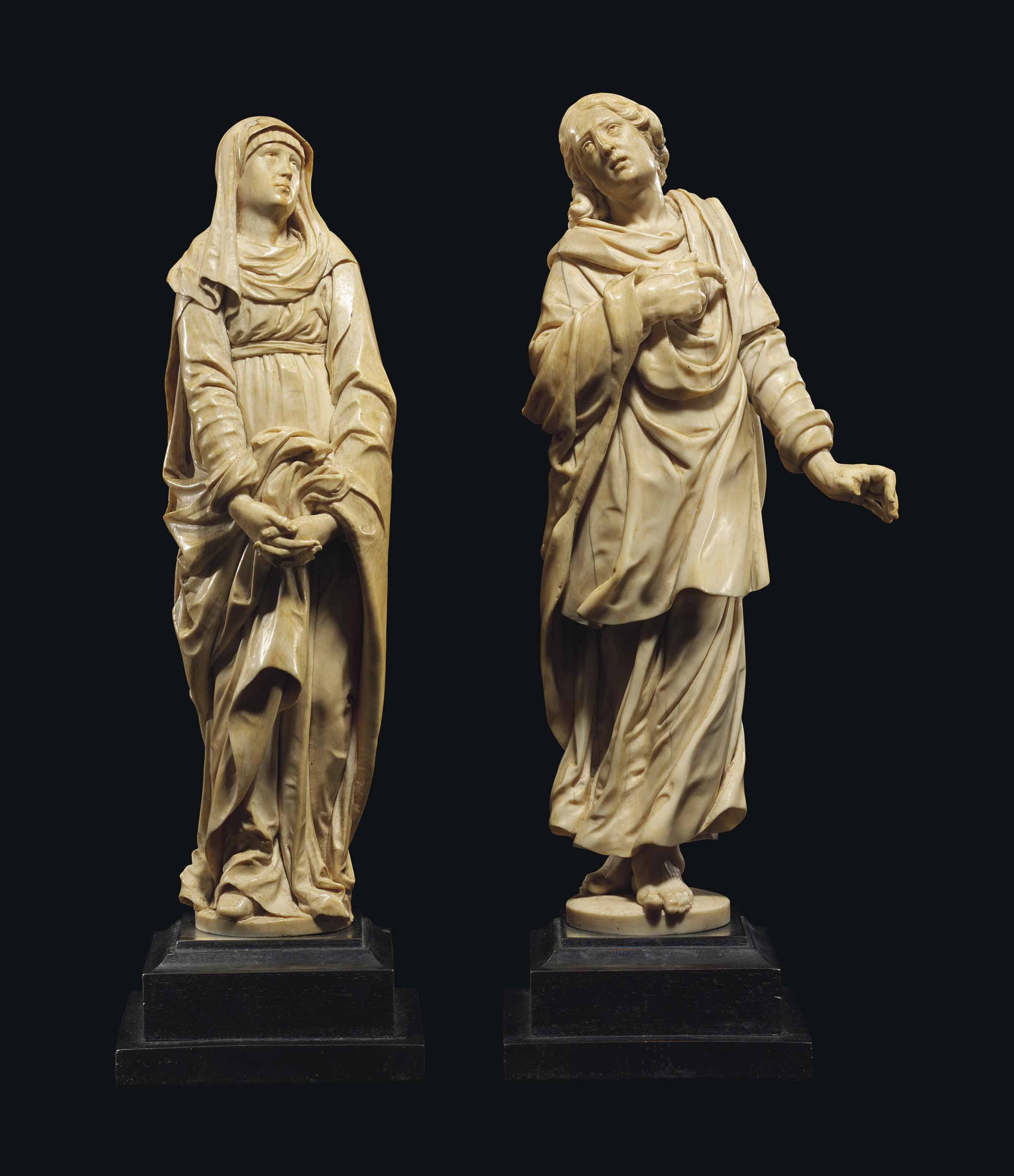 A PAIR OF IVORY FIGURES OF THE VIRGIN AND SAINT JOHN , CIRCLE OF JAN