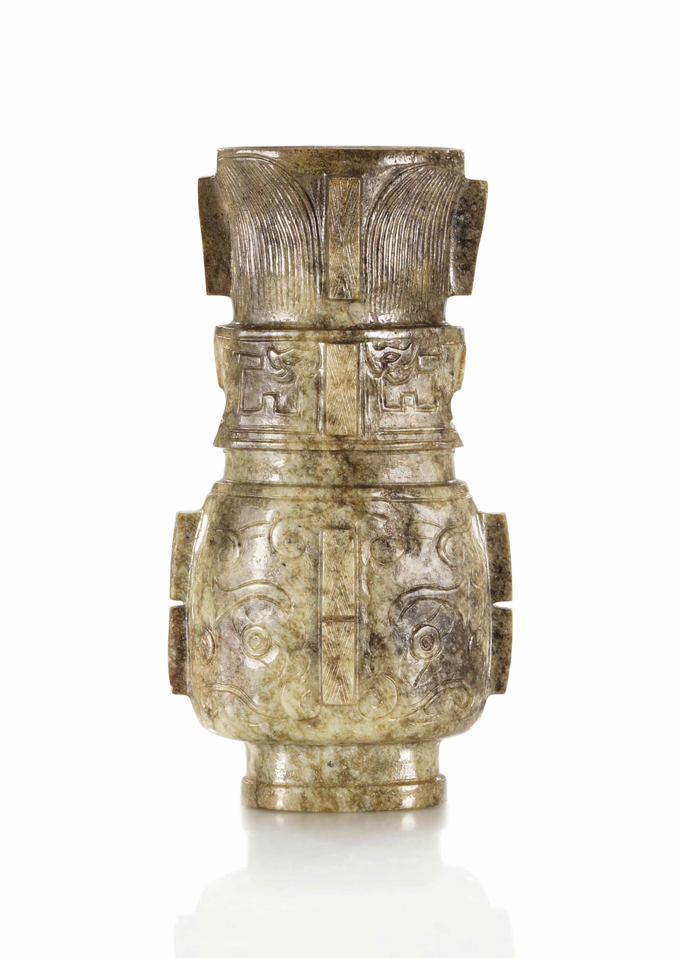 A SMALL ARCHAISTIC MOTTLED GREY JADE VASE, GU , MING DYNASTY, 17TH
