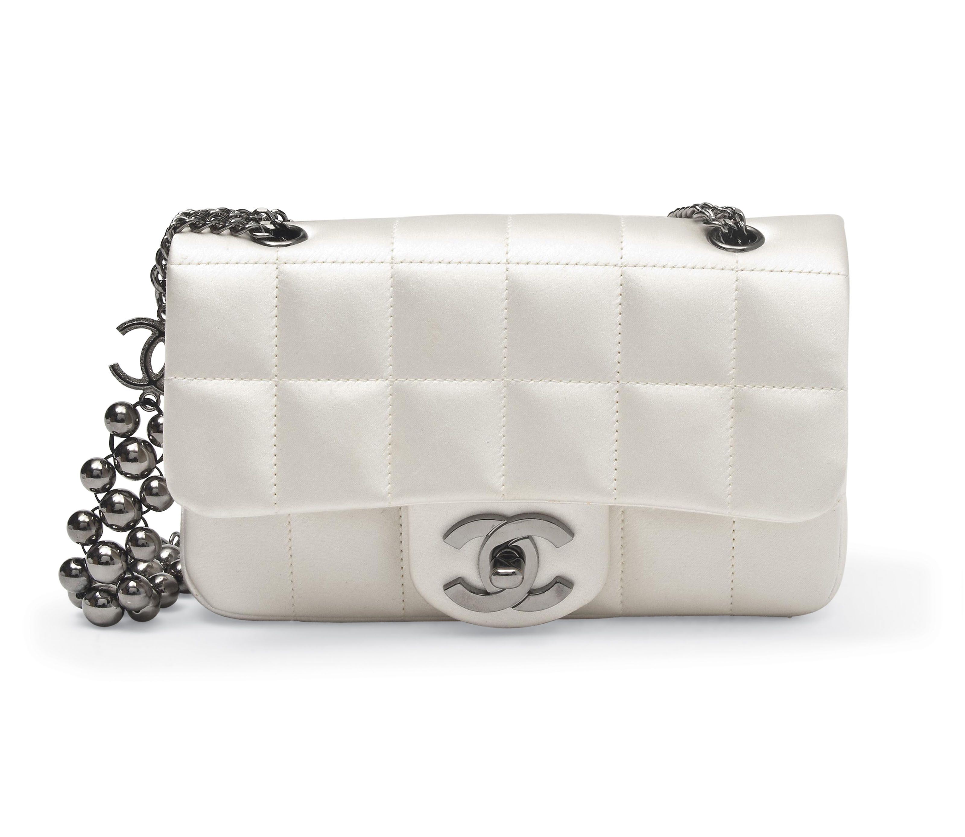 AN IVORY SATIN SINGLE FLAP BAG, CHANEL, 2005-06 Christie's