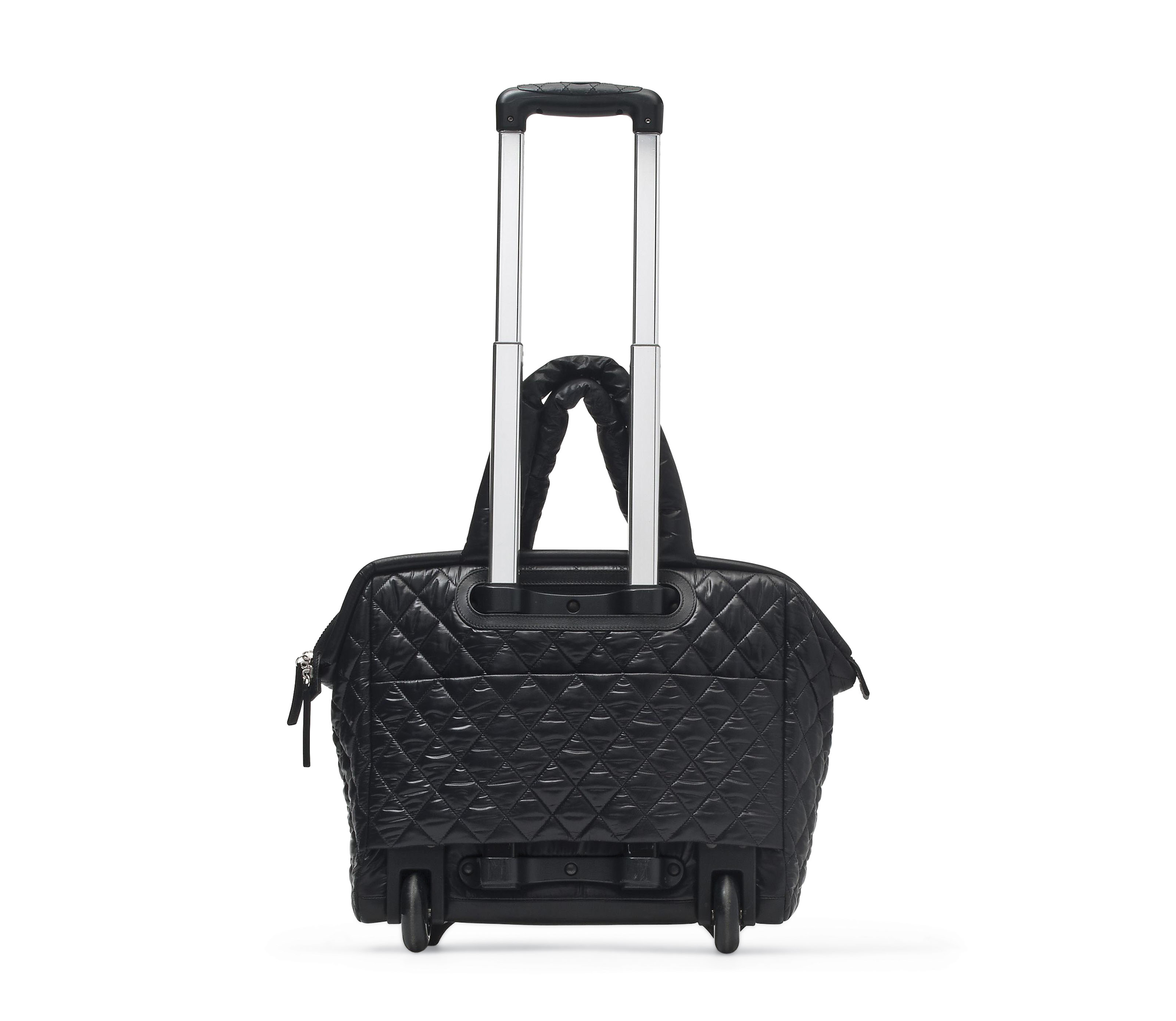 A BLACK NYLON QUILTED COCO COCOON ROLLING BAG CHANEL 2012 Christie s