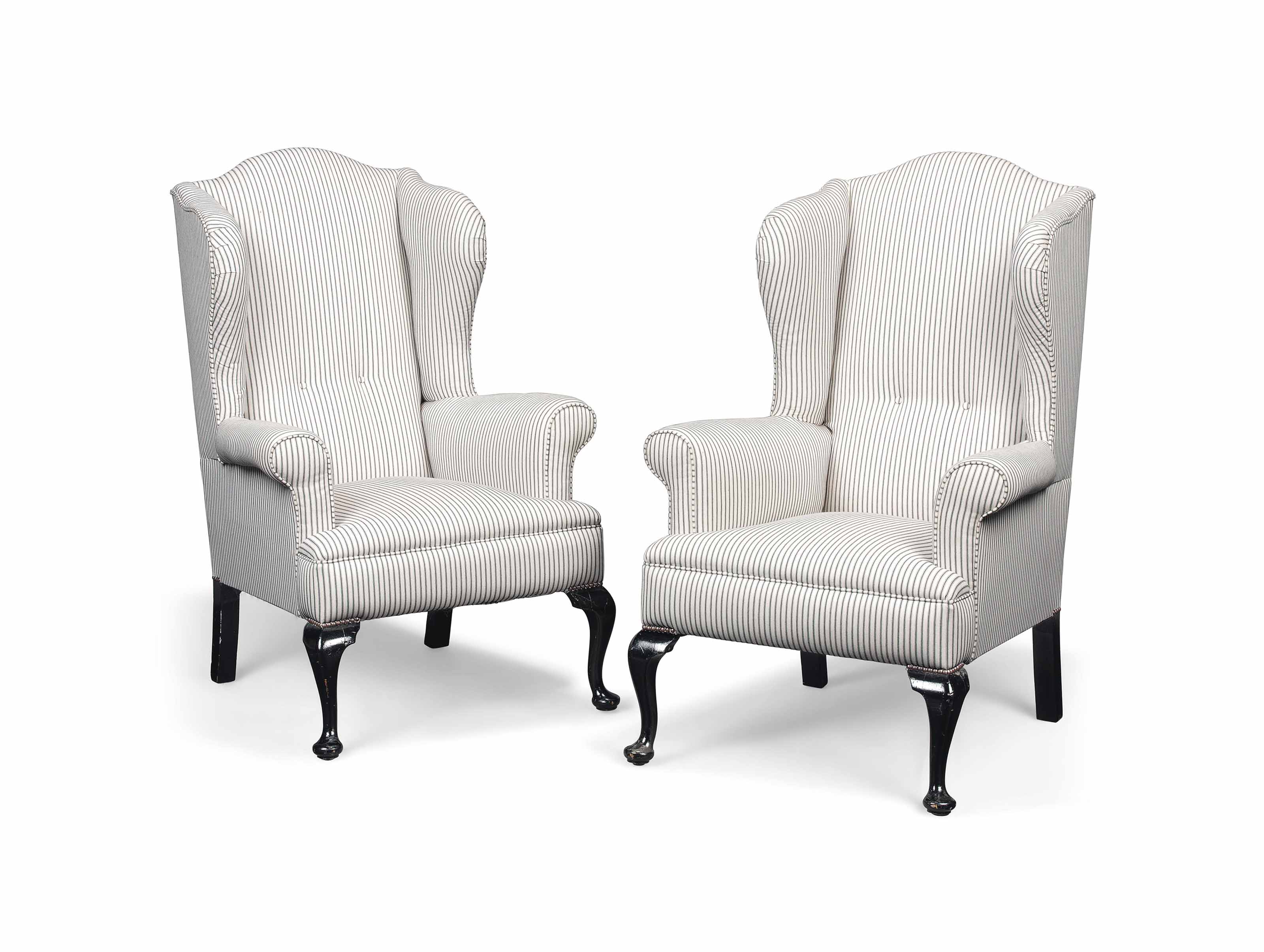 A PAIR OF WING ARMCHAIRS , 20TH CENTURY Christie's