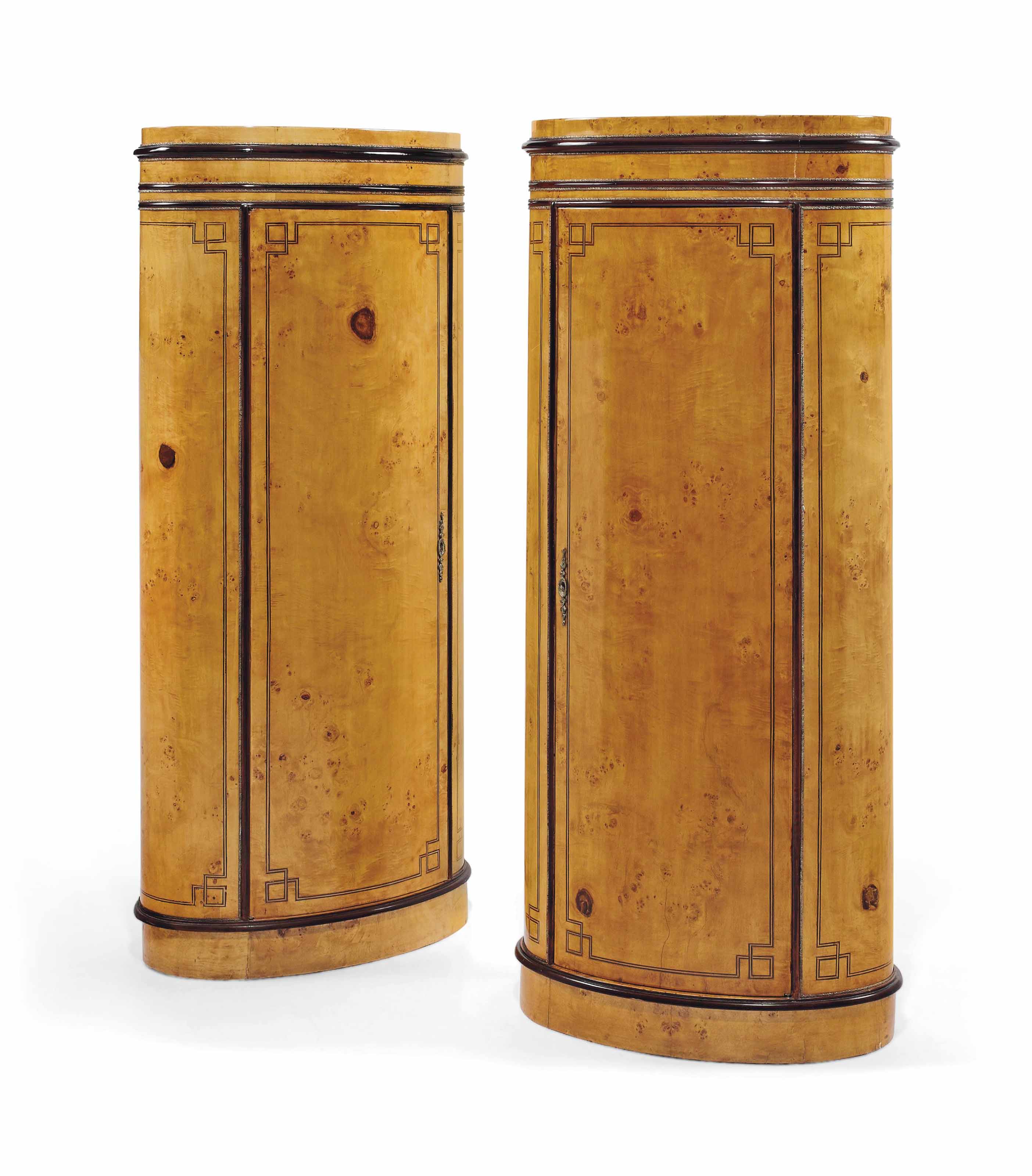 A Pair Of Gilt Metal Mounted Birdseye Maple Pedestal Cabinets Of