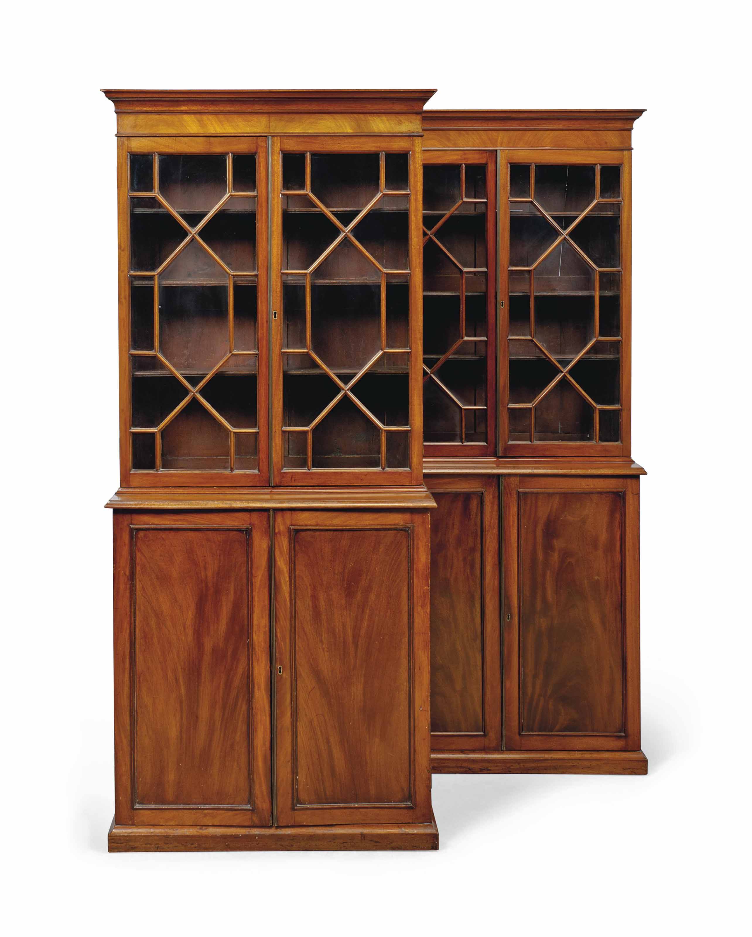 A PAIR OF MAHOGANY BOOKCASES