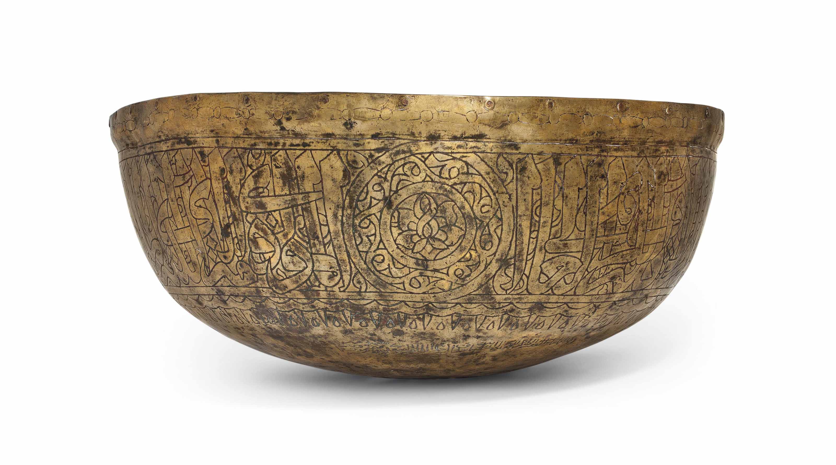 A LARGE MAMLUK BRASS BASIN , CAIRO, EGYPT, WITH DATE OF AH 920/151415