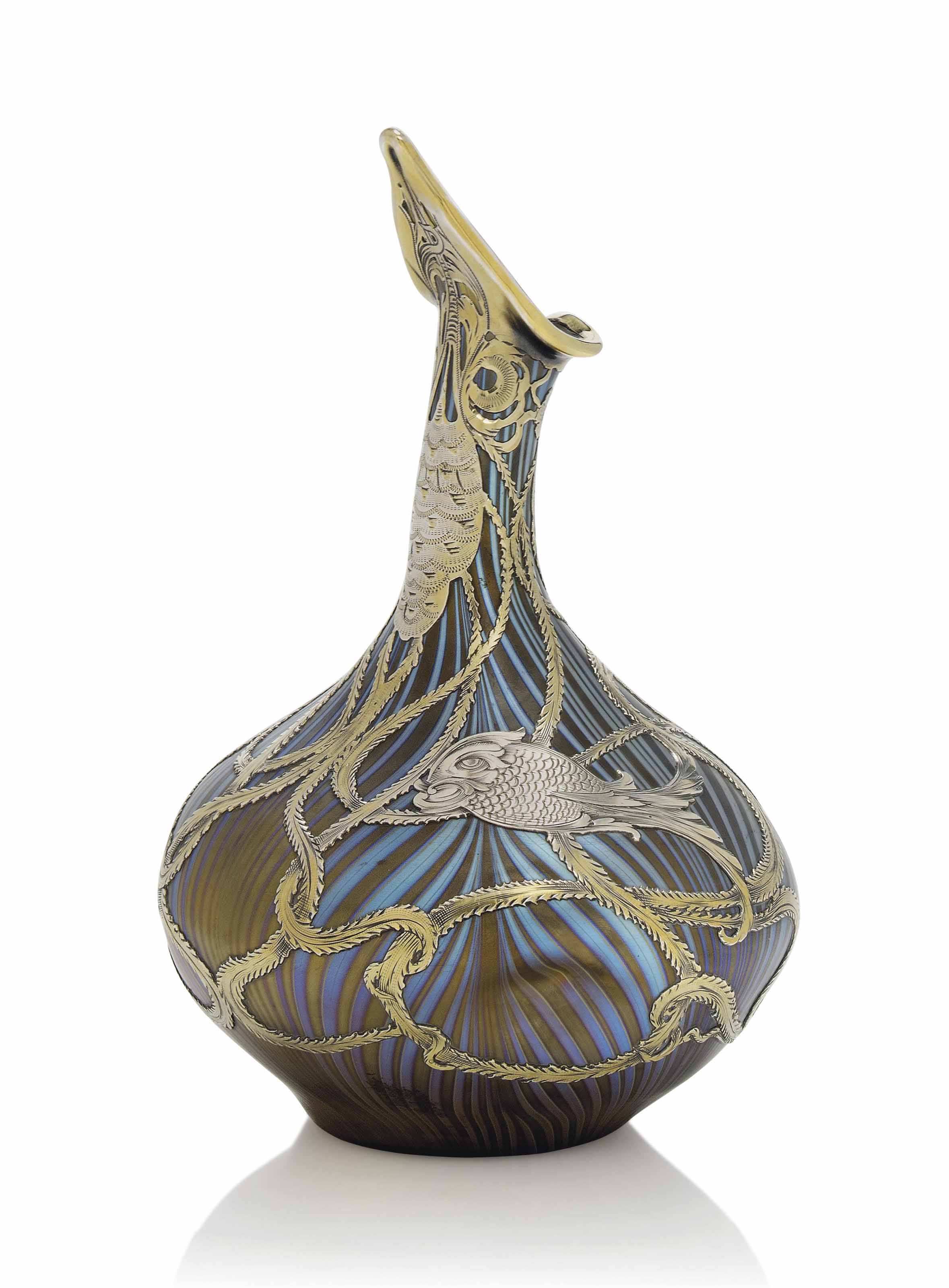 A Loetz Iridescent Glass Rose Sprinkler Shaped Vase With Silver