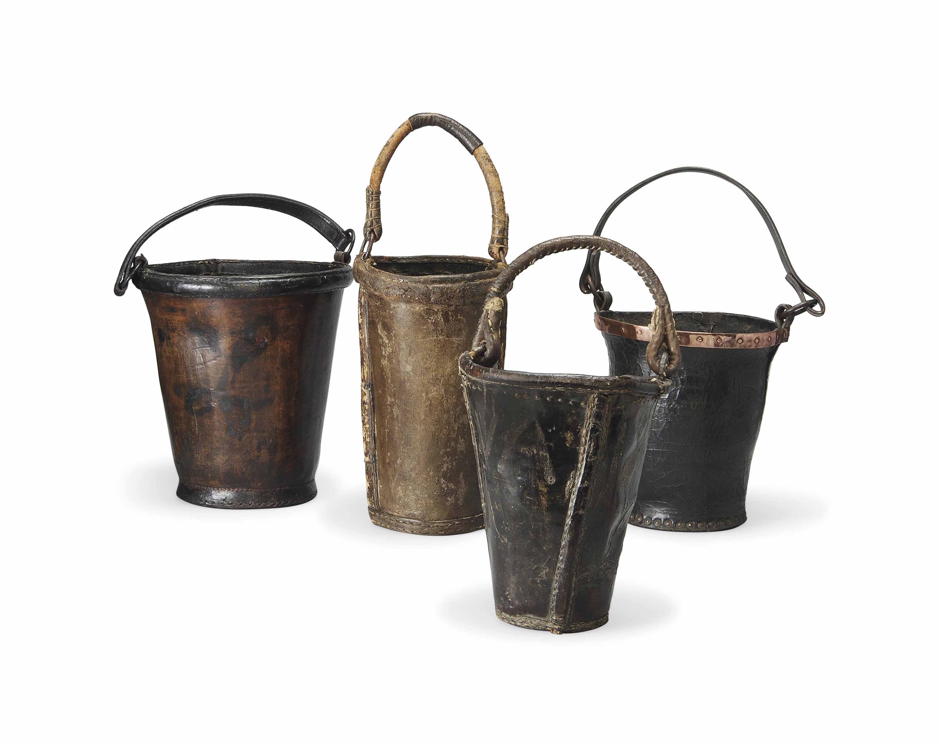 A GROUP OF FOUR LEATHER FIRE BUCKETS , 19TH CENTURY Christie's