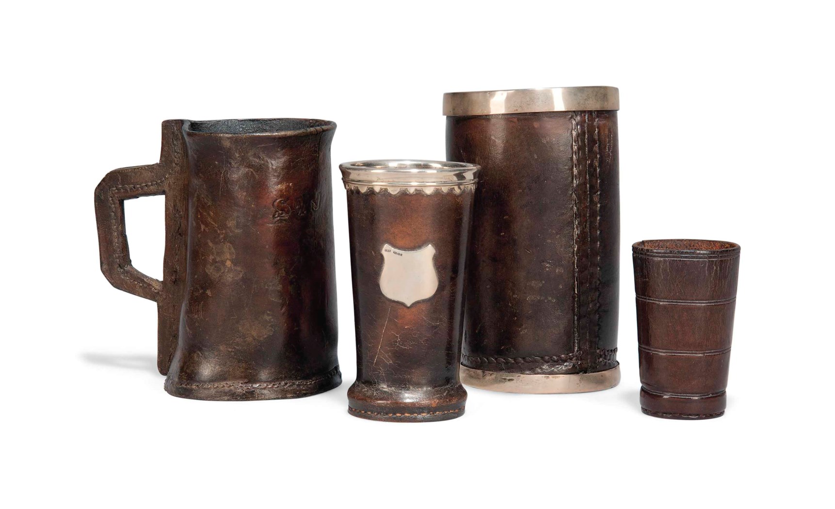 A GROUP OF FOUR VARIOUS LEATHER VESSELS, LATE 18TH AND 19TH CENTURY