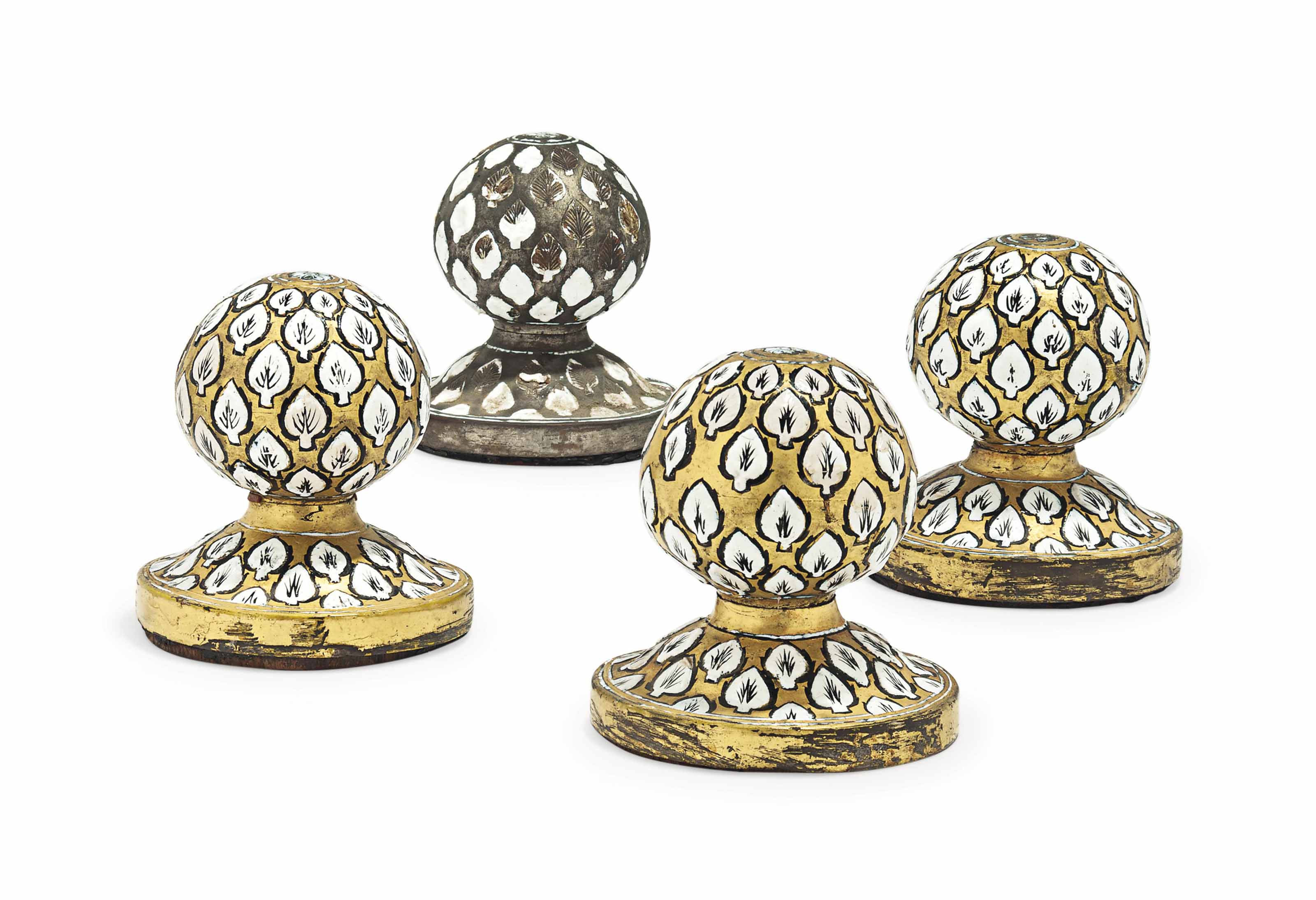 FOUR ENAMELLED GILTCOPPER CARPET WEIGHTS (MIRI FARSH)