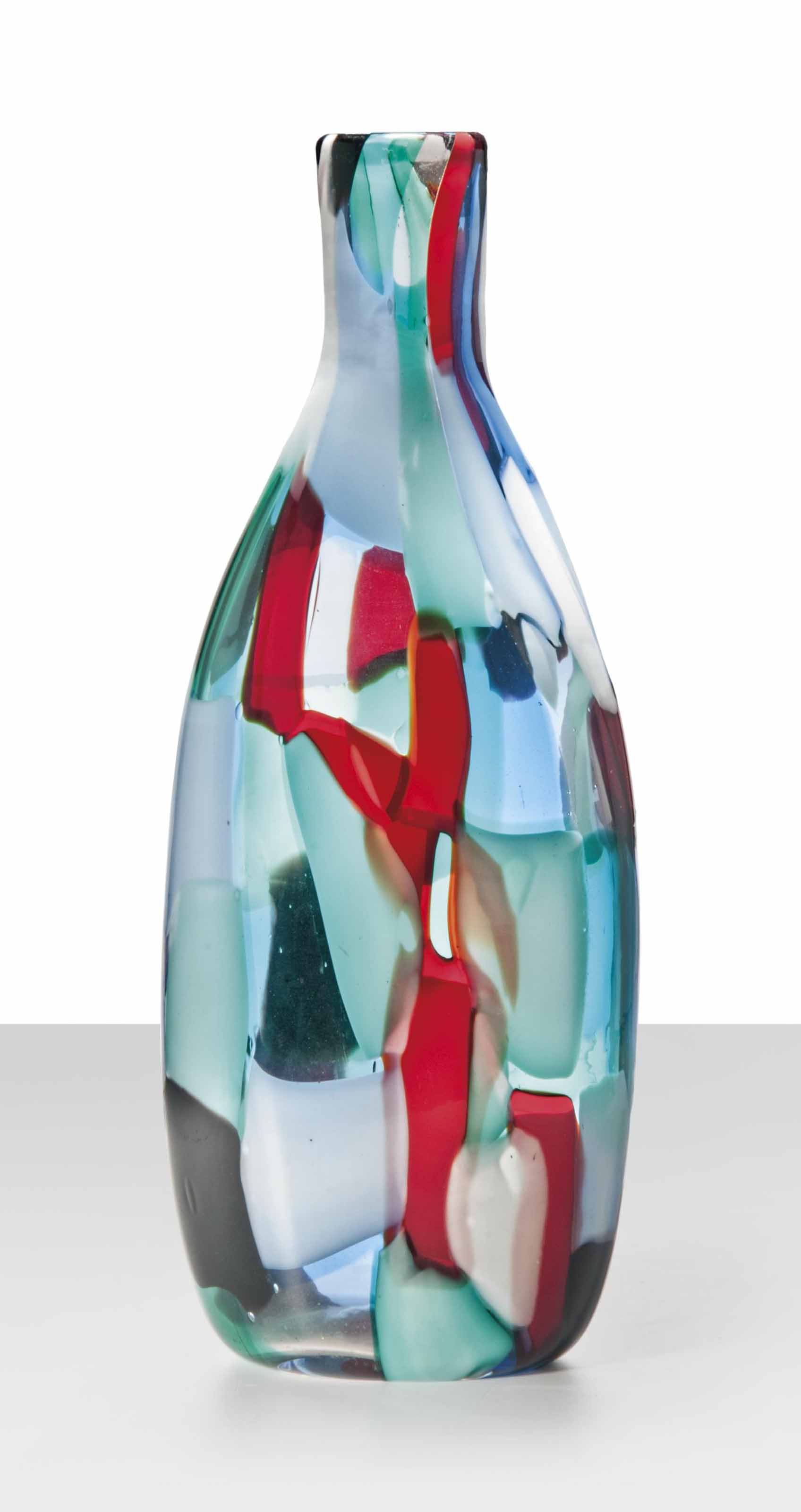 PAOLO VENINI (18951959) FOR VENINI (EST. 1925) , A 'PEZZATO' BOTTLE