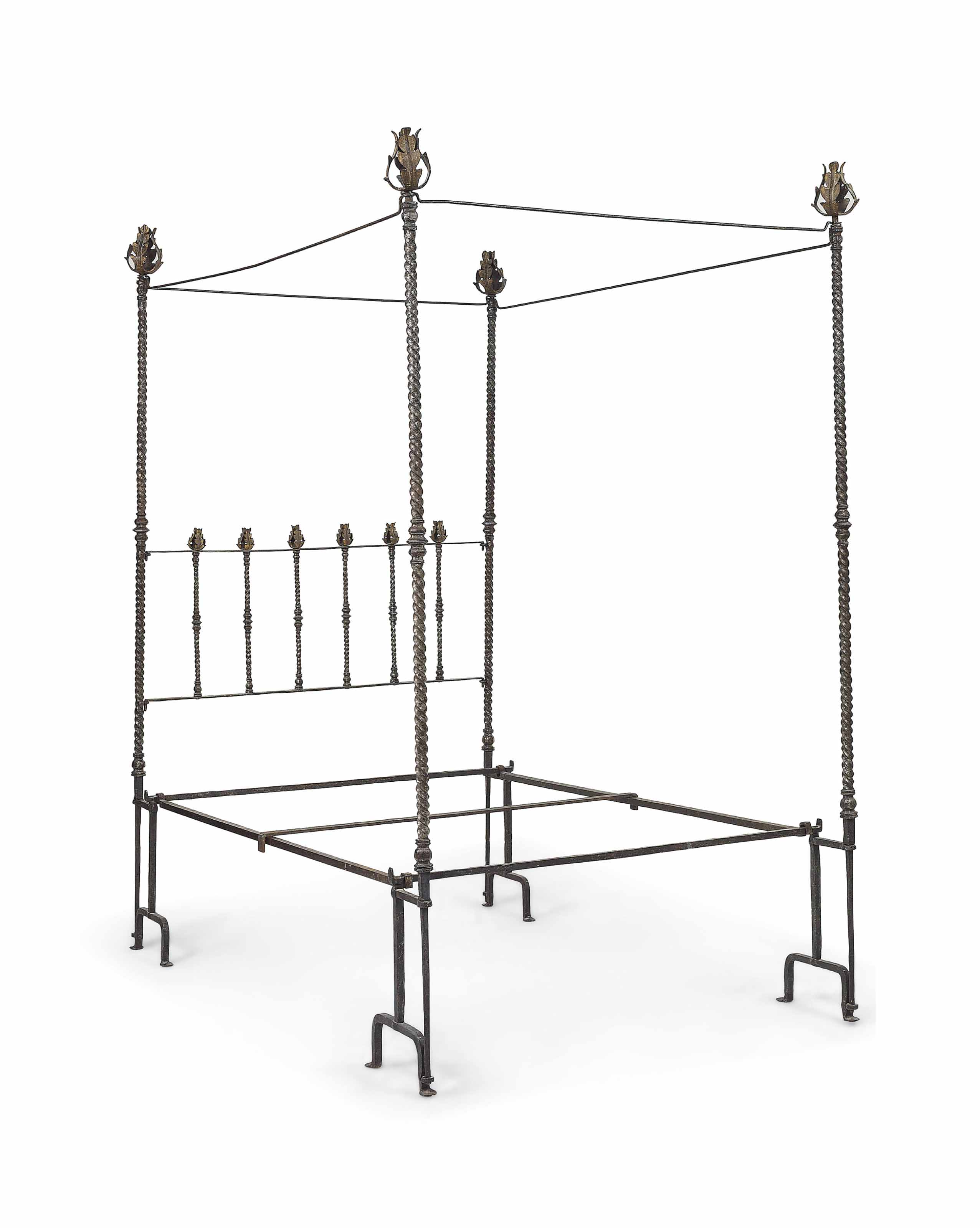 AN ITALIAN PARCELGILT WROUGHTIRON FOURPOSTER BED