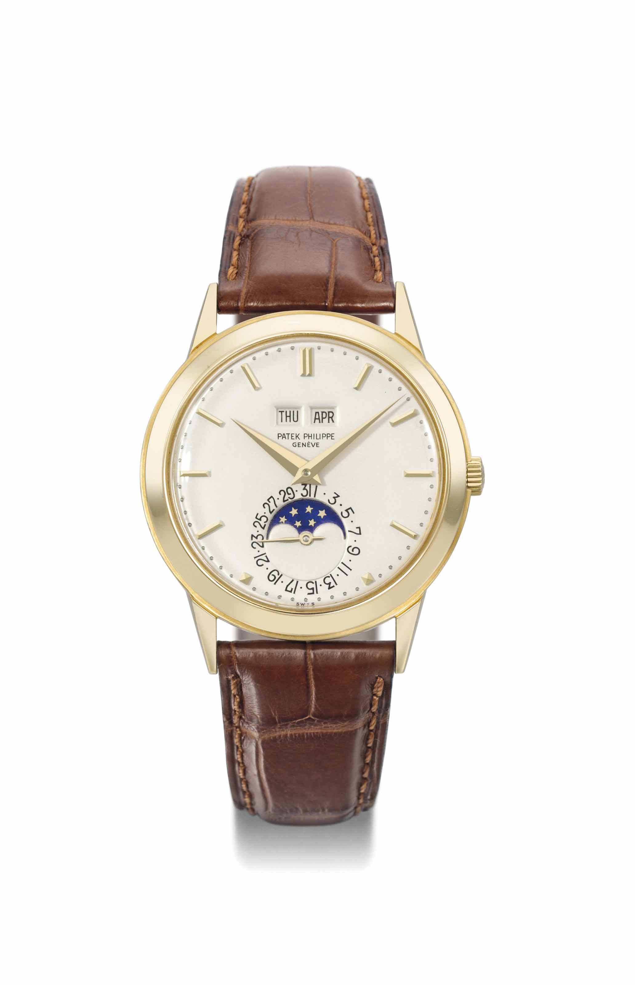 Patek Philippe. A very fine and rare 18K gold perpetual calendar