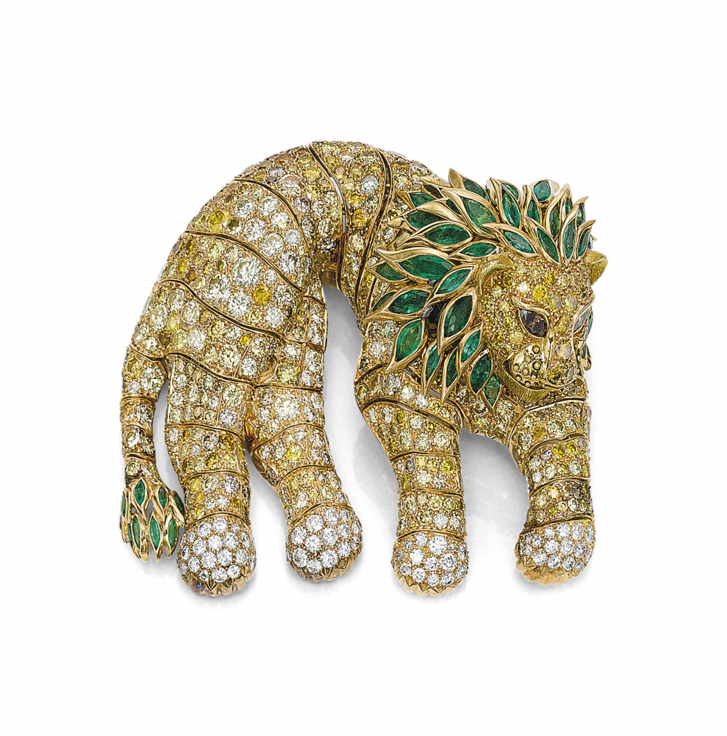 A coloured diamond, diamond and emerald lion shoulder brooch by Ren&eacute; Boivin. Sold for CHF365,000 on 11 November 2014 at Christie&rsquo;s in Geneva
