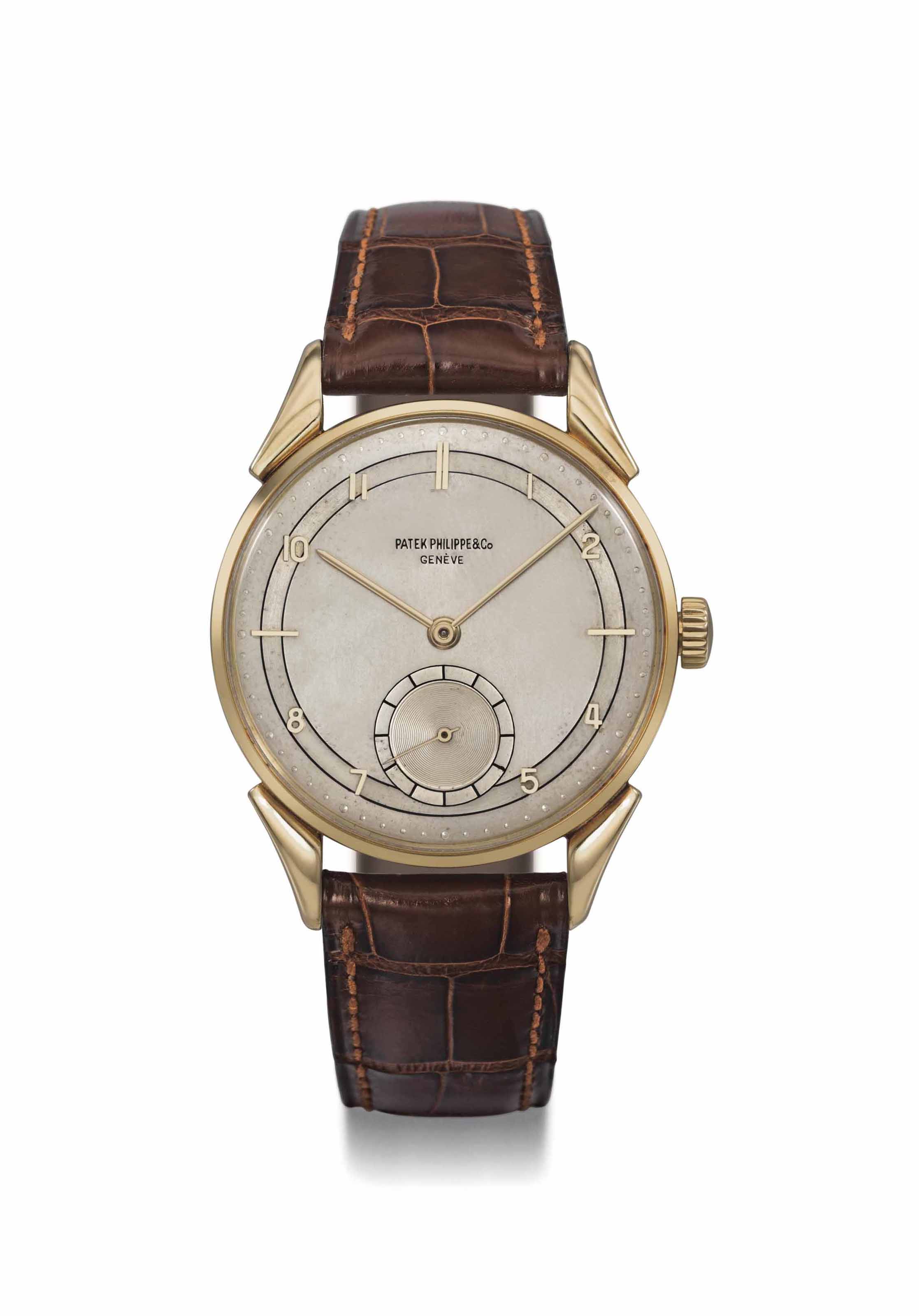 PATEK PHILIPPE. AN EXTREMELY FINE RARE AND HISTORICALLY IMPORTANT 18K GOLD PERPETUAL CHRONOGRAPH WRISTWATCH WITH MOON PHASES SIGNED PATEK PHILIPPE CO. GENEVE REF. 1518 MOVEMENT NO. 863 473 CASE NO. 63...
