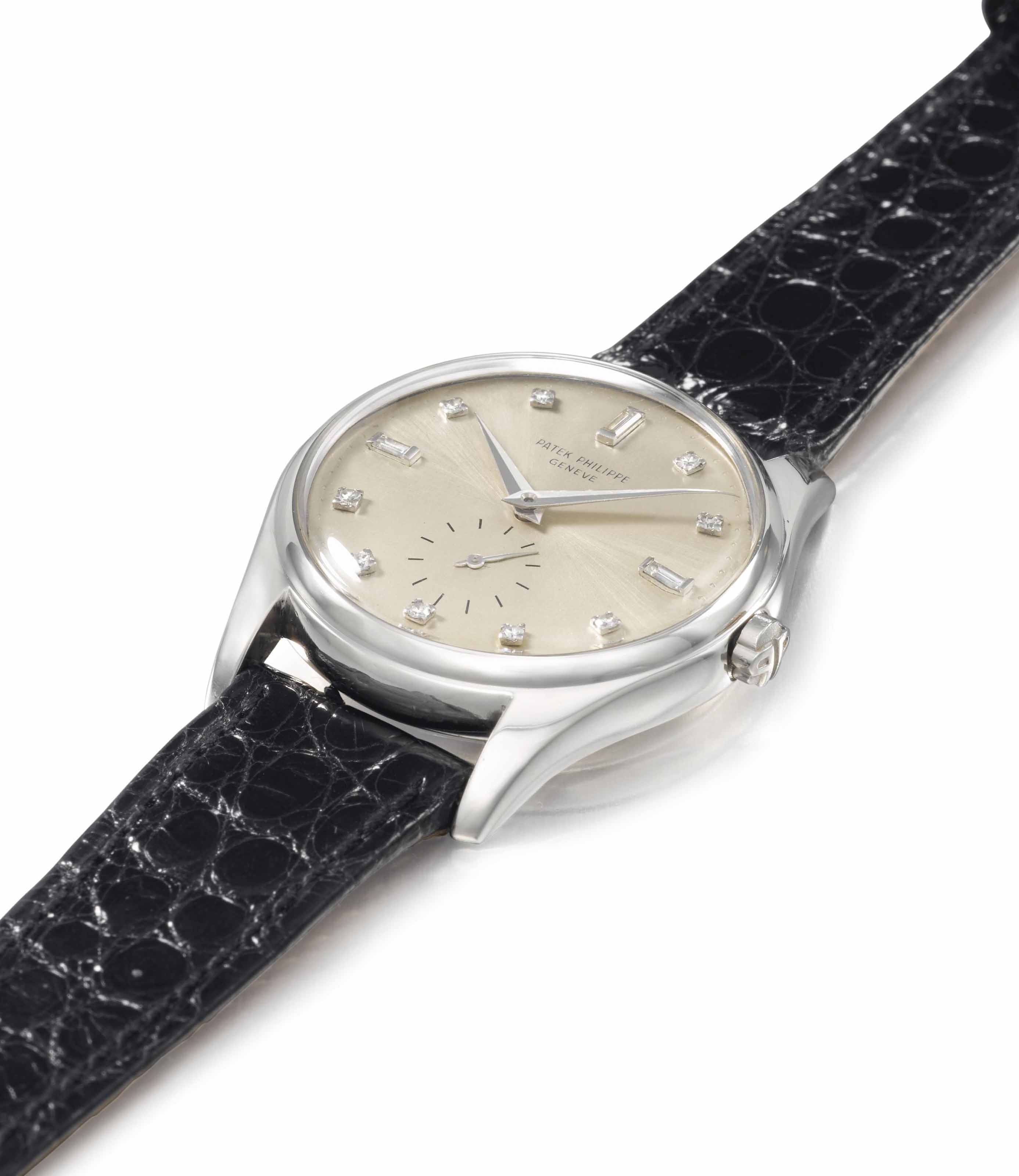 Patek Philippe An Extremely Fine And Rare Platinum And Diamond Set Automatic Wristwatch Accompanied by presentation box and extract from the archives. patek philippe an extremely fine and